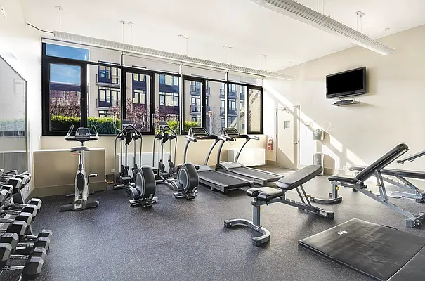 125 North 5th Street, Unit 3D Brooklyn, NY 11249 - Photo 6 of 10 a view of a room with gym equipment
