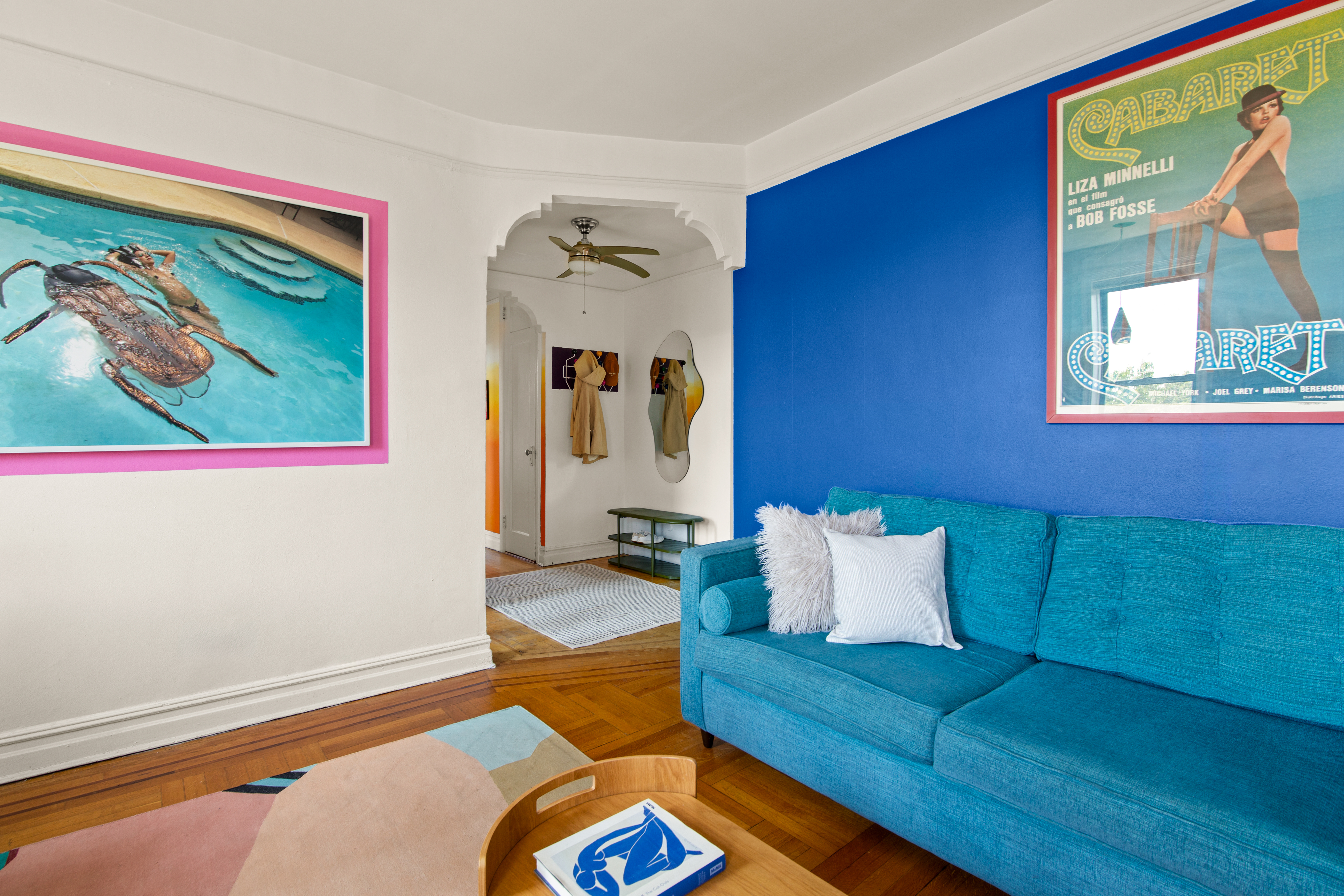 1710 Avenue H, Unit D6 Brooklyn, NY 11230 - Photo 2 of 9 a living room with furniture and a rug