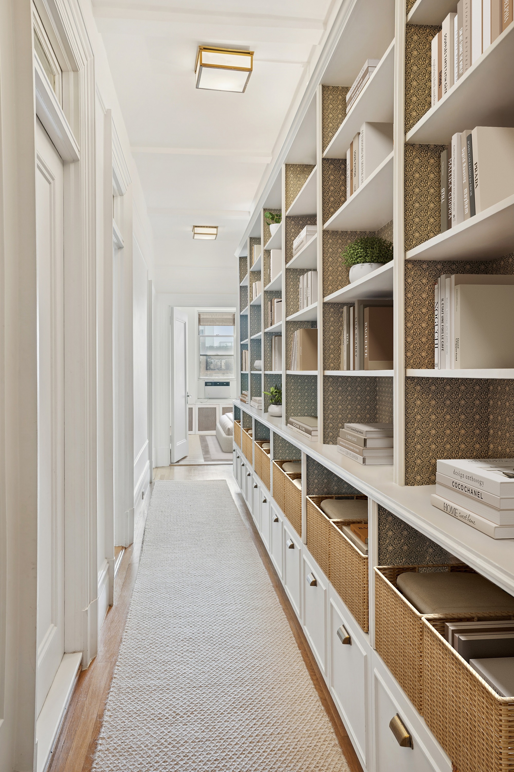 333 Central Park West, Unit 115 Manhattan, NY 10025 - Photo 6 of 13 a hallway with cabinets