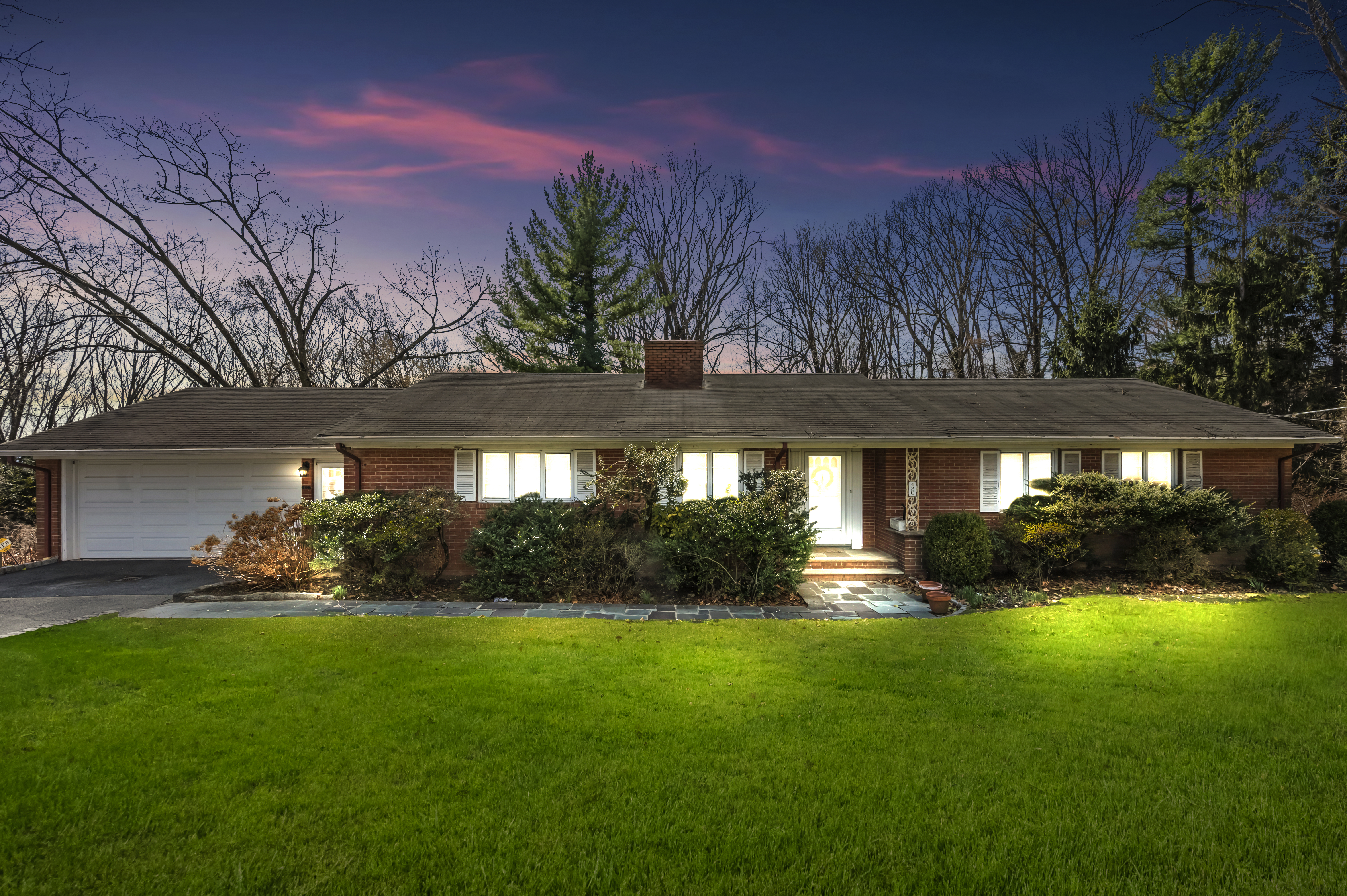 420 Ocean Terrace Staten Island, NY 10301 - Photo 1 of 28 a front view of a house with a yard and garage