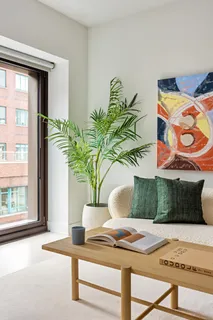 a view of a dining room with a table and chair