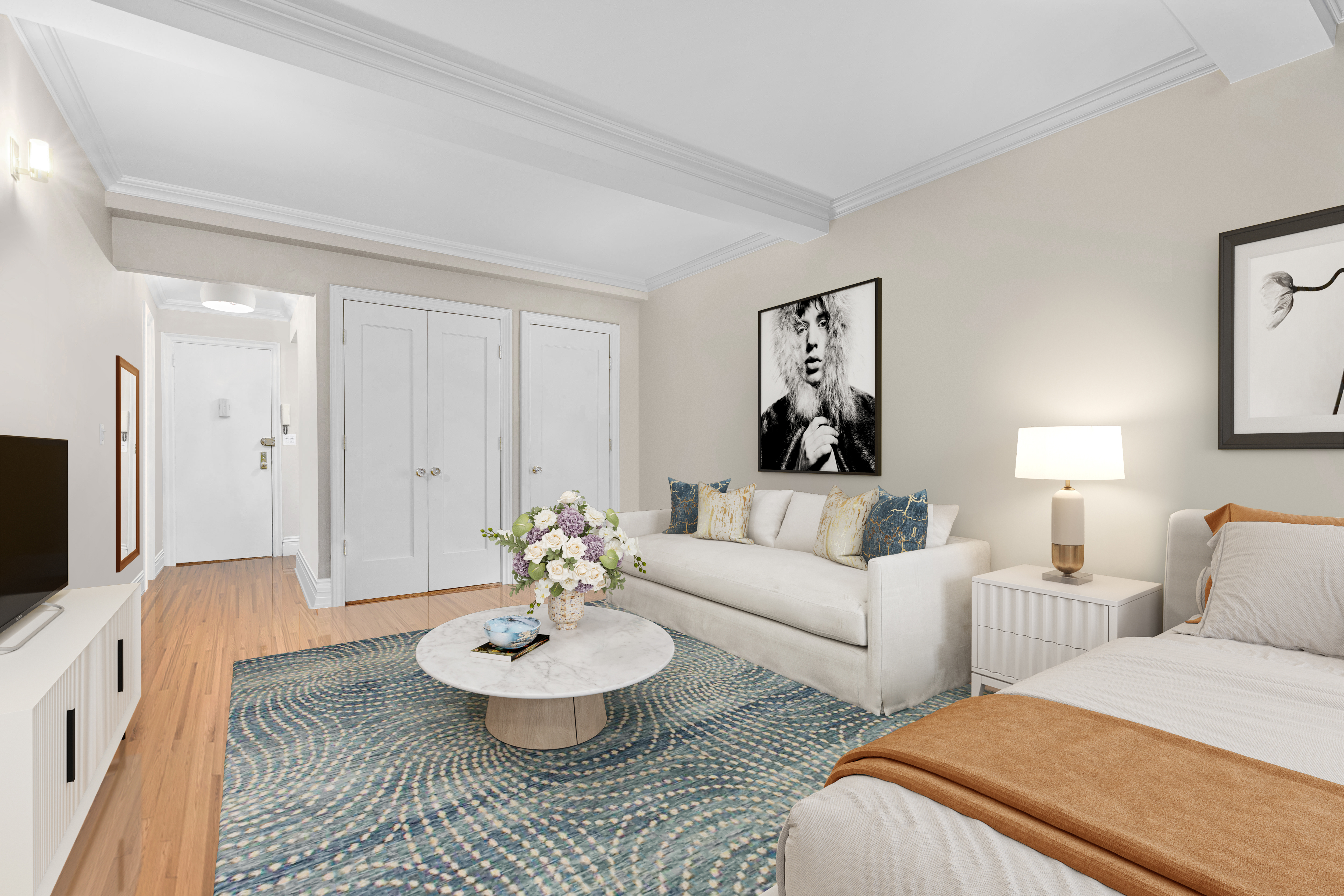 235 West 102nd Street, Unit 3B Manhattan, NY 10025 - Photo 9 of 20 a living room with furniture and a flat screen tv