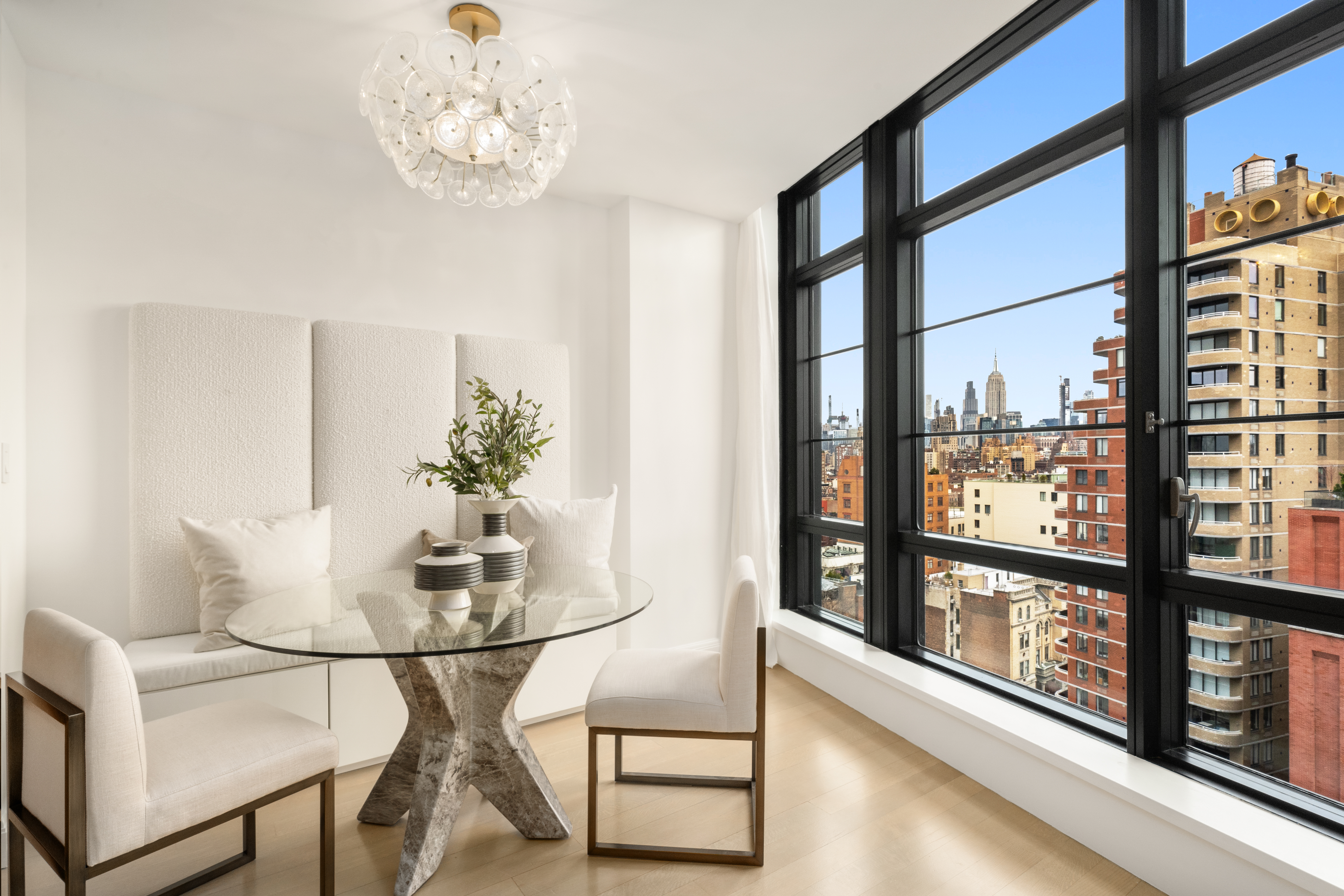 150 Charles Street, Unit 14B Manhattan, NY 10014 - Photo 6 of 20 a dining room with furniture and window