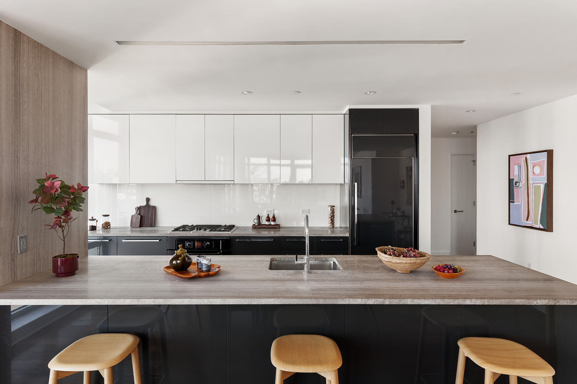 2 Northside Piers, Unit 25P Brooklyn, NY 11249 - Photo 8 of 26 a room with a sink a potted plant and cabinets
