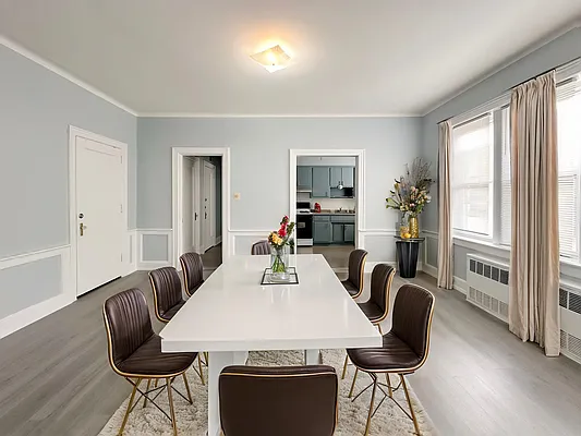 364 97th Street, Unit 2 Brooklyn, NY 11209 - Photo 2 of 8 a view of a dining room with furniture window and wooden floor