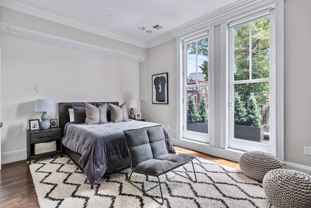 361 Beacon Street, Unit PH Boston, MA 02116 - Photo 6 of 9 a bedroom with a bed and wooden floor