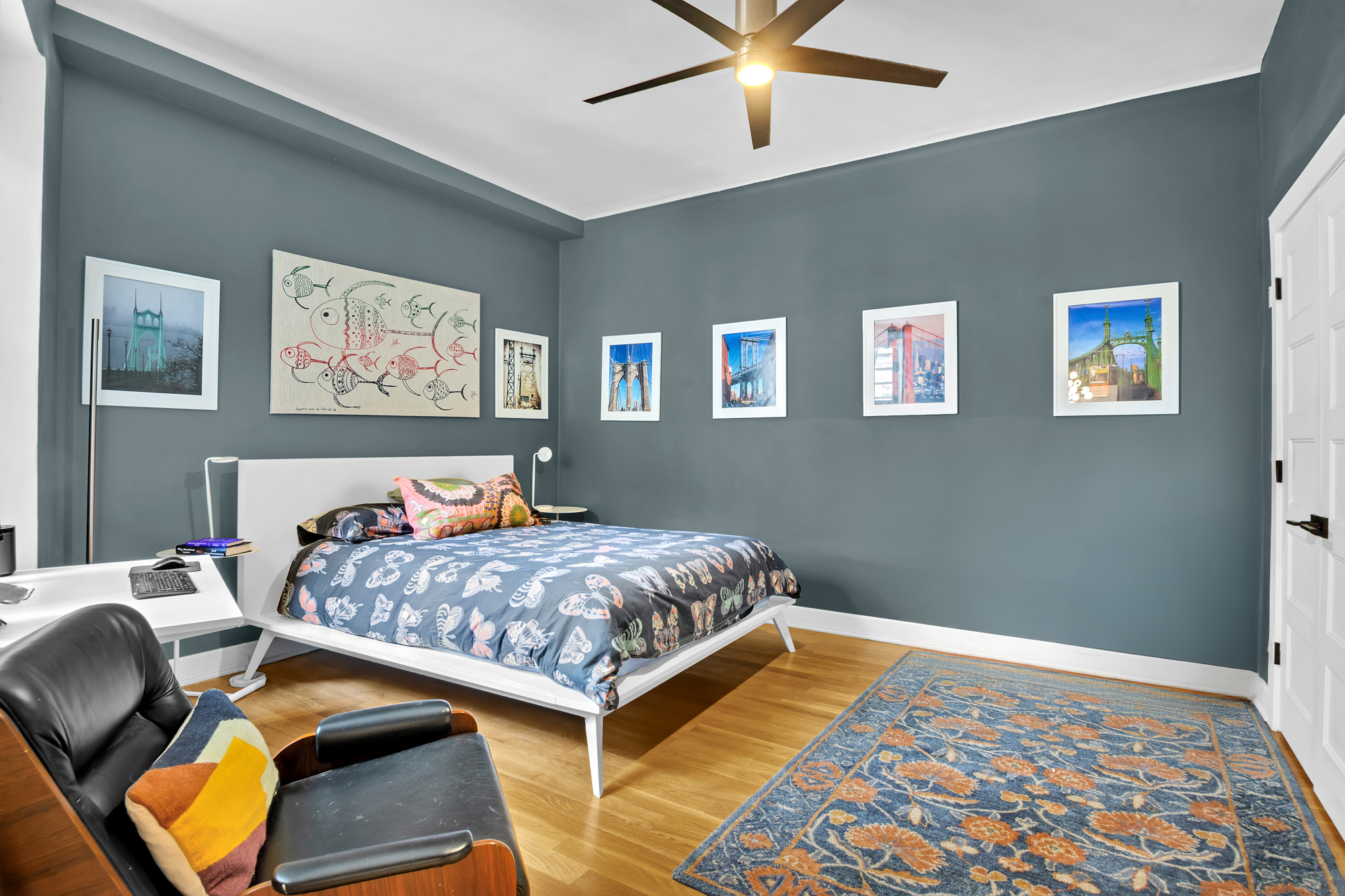 790 Riverside Drive, Unit 2LX Manhattan, NY 10032 - Photo 5 of 10 a bedroom with a bed and painting on the wall