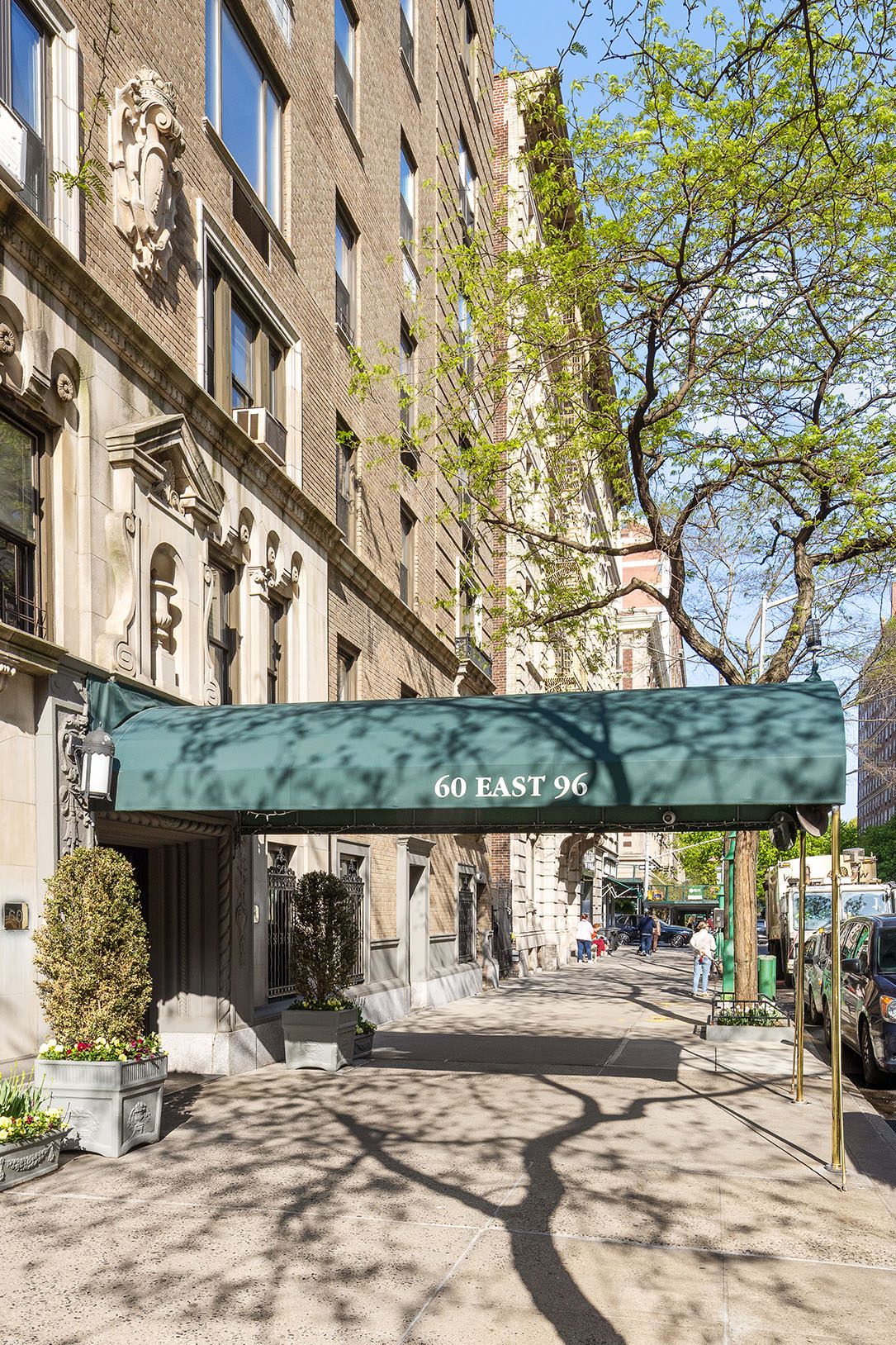 60 East 96th Street, Unit 6C Manhattan, NY 10128 - Photo 8 of 9 front view of a building with a street