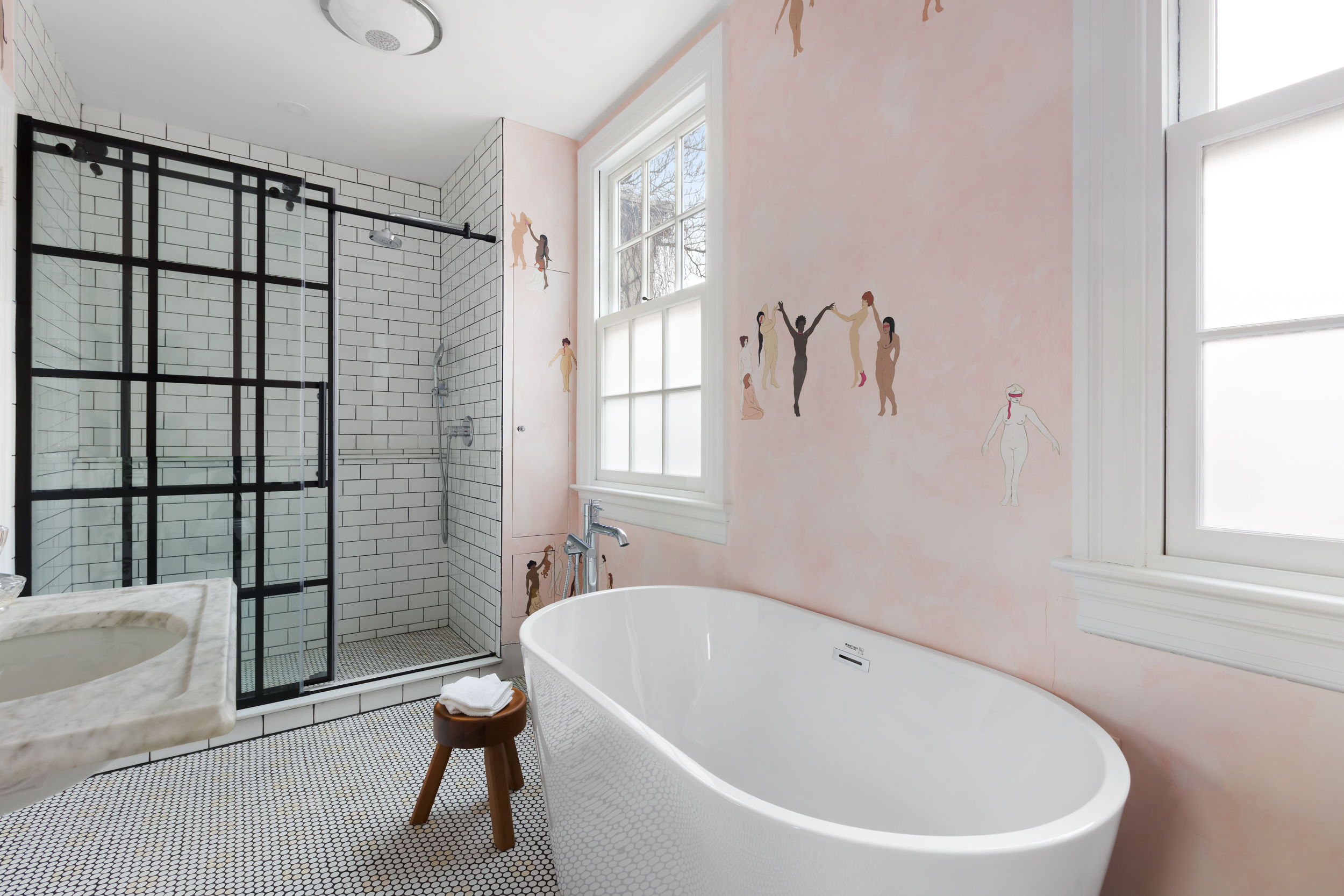 49 Barrow Street Manhattan, NY 10014 - Photo 17 of 25 a white bath tub sitting next to a window