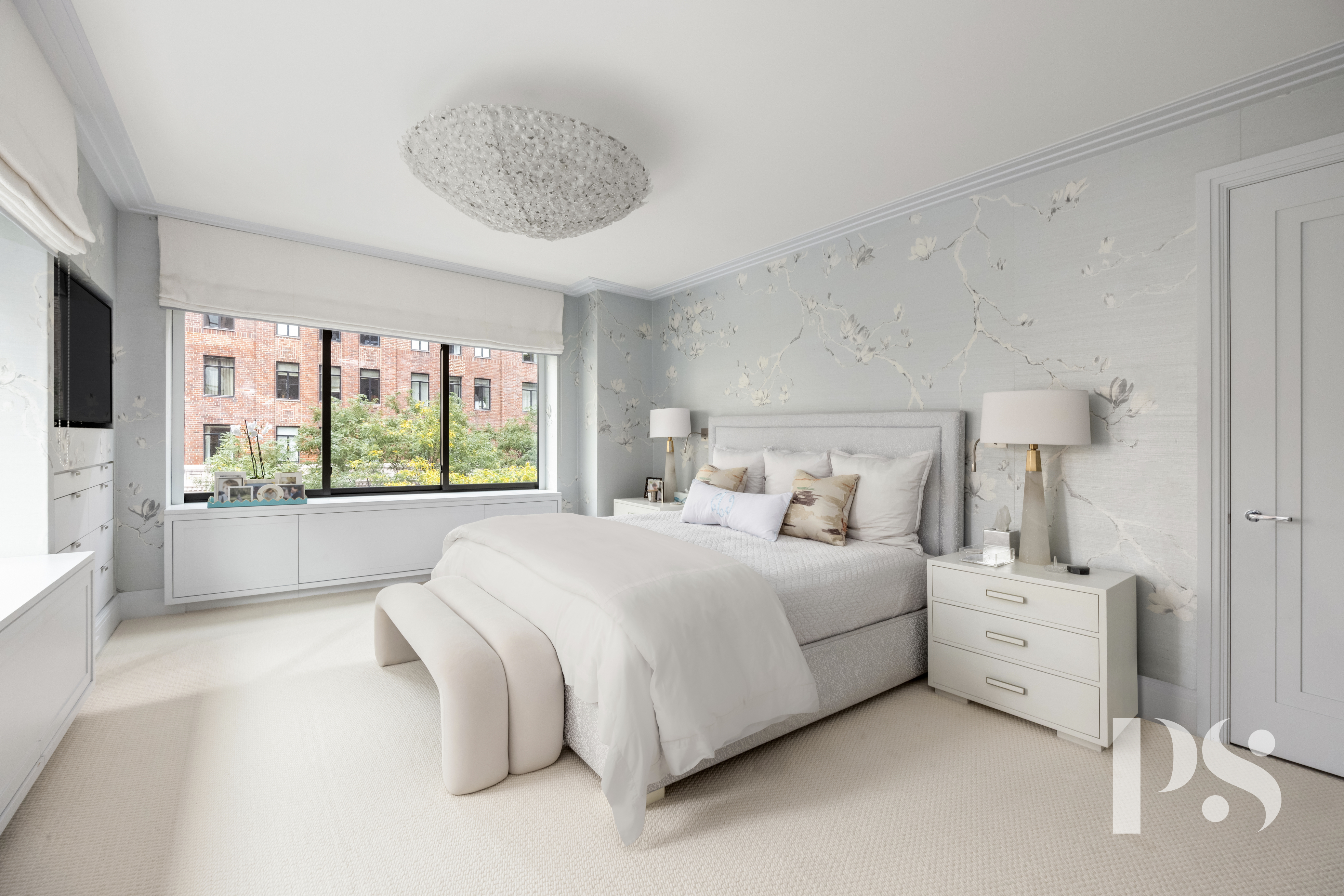 733 Park Avenue, Unit 4 Manhattan, NY 10021 - Photo 18 of 29 a bedroom with a large bed and a large window