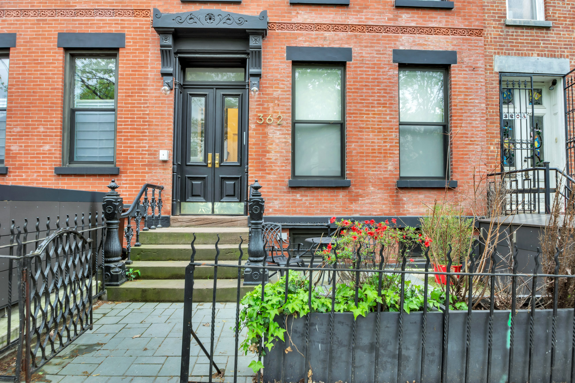 362 13th Street, Unit 3 Brooklyn, NY 11215 - Photo 10 of 13 a view of a house with a small yard and wooden floor and fence