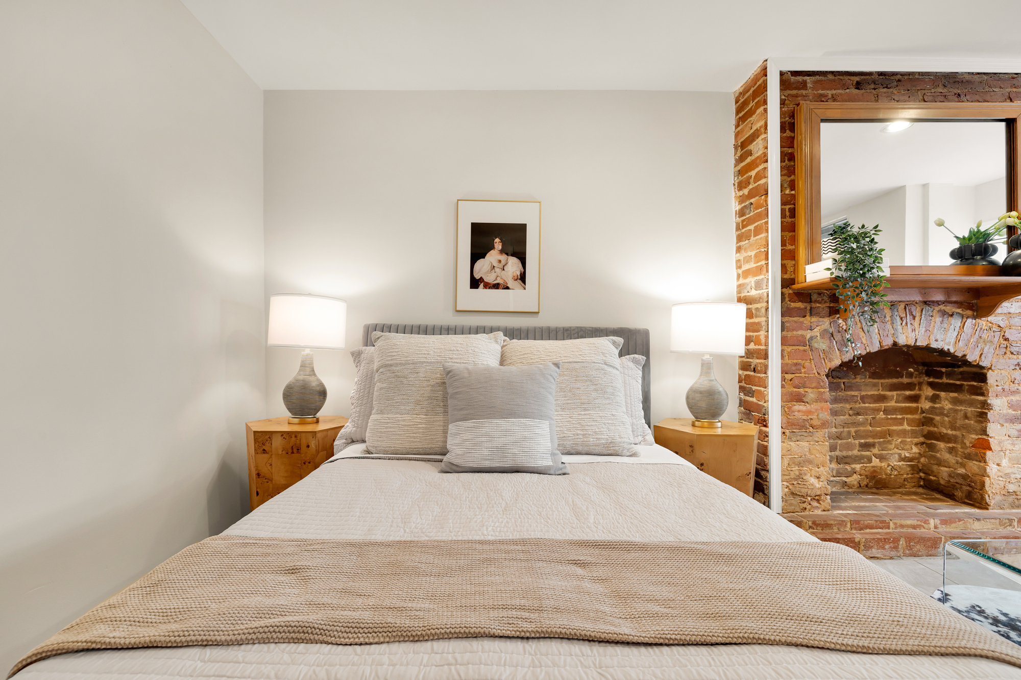 903 F Street Northeast Washington, DC 20002 - Photo 32 of 41 a bedroom with a bed and a mirror