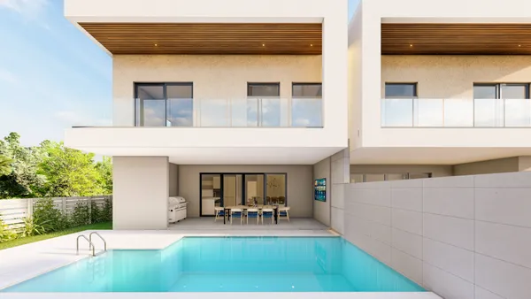a view of house and outdoor space with swimming pool