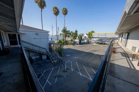 a front view of building with yard