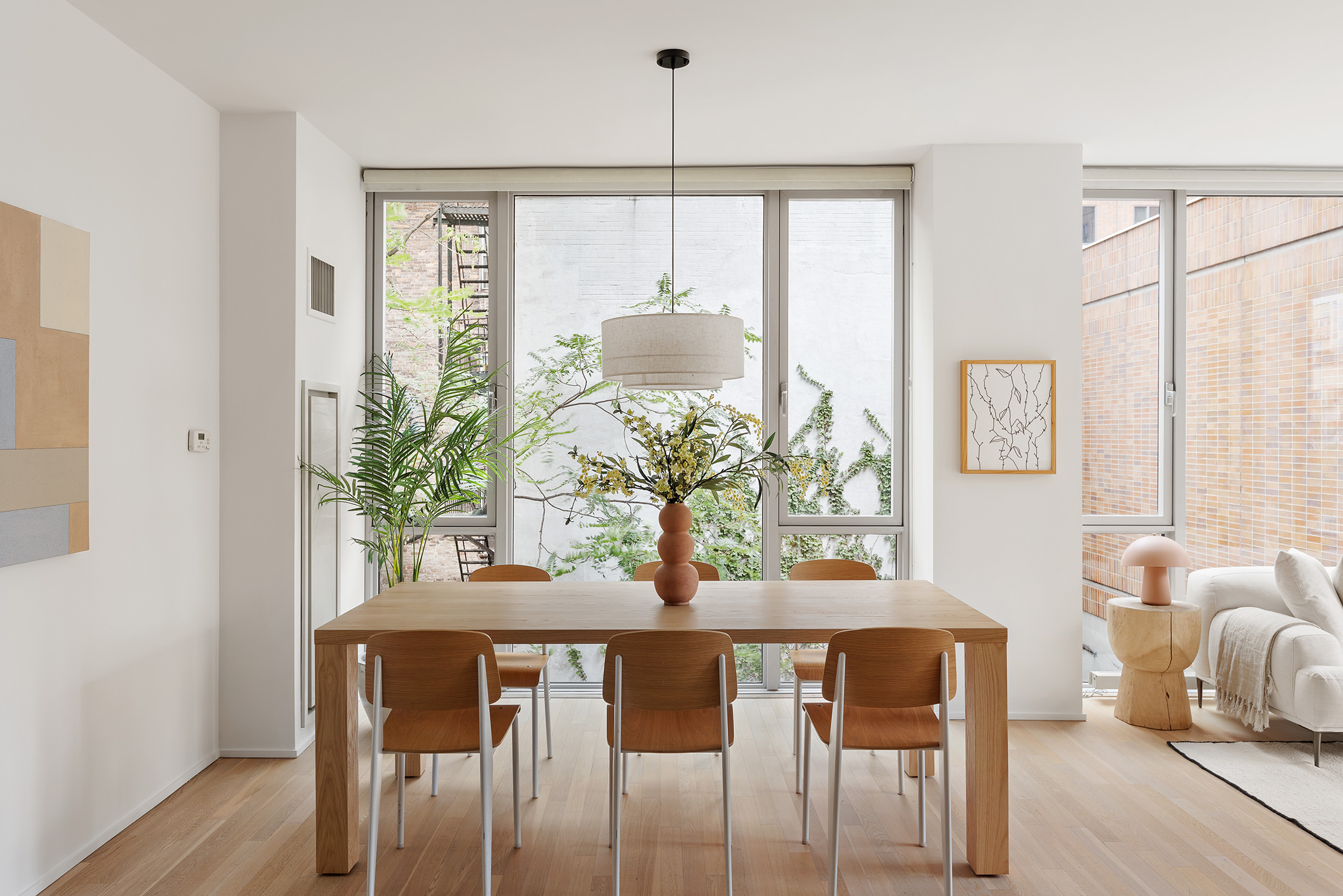 110 3rd Avenue, Unit 4B Manhattan, NY 10003 - Photo 9 of 15 a dining room with furniture and window