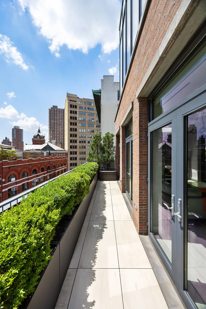 a view of a balcony with city view