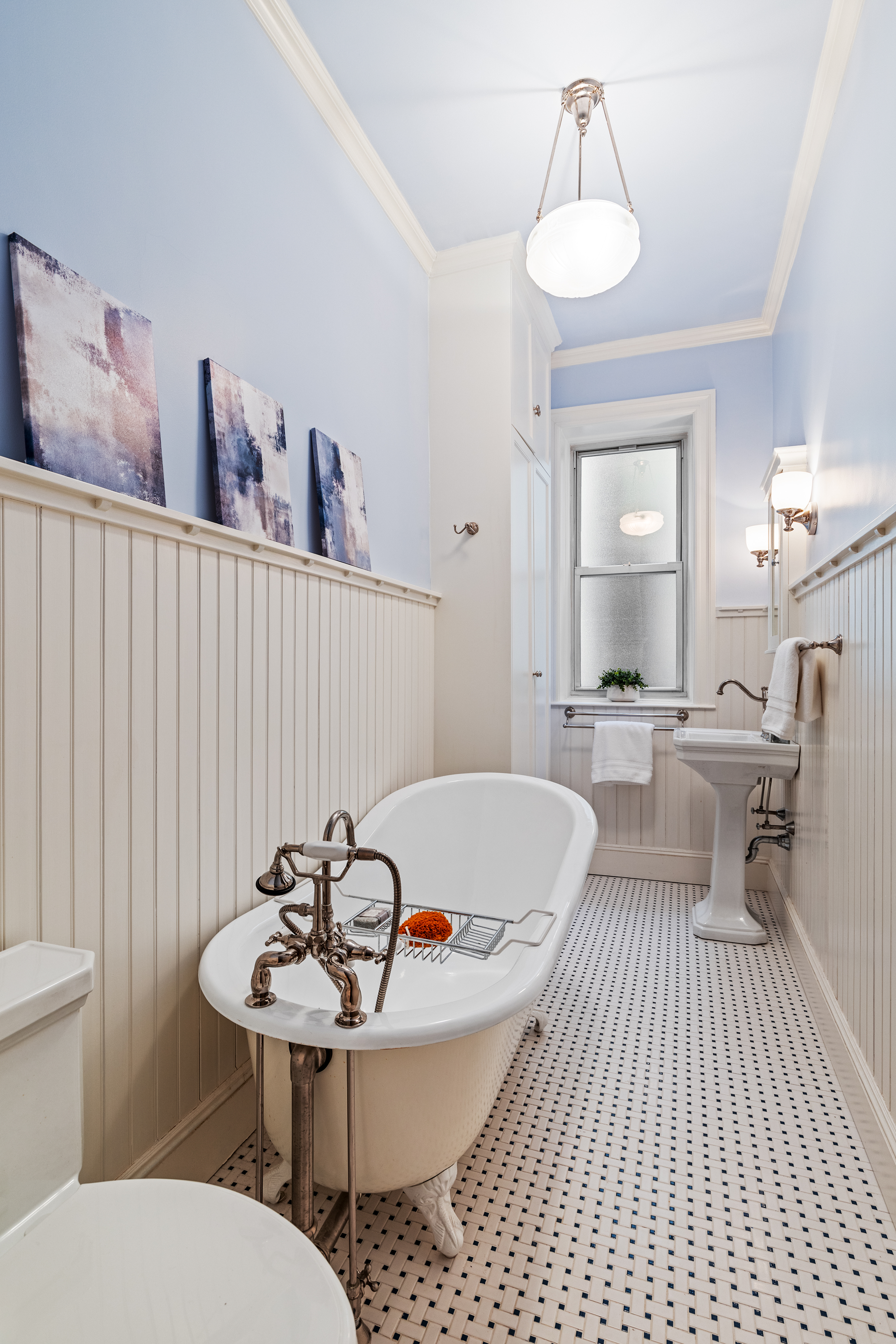 131 Riverside Drive, Unit 2C Manhattan, NY 10024 - Photo 8 of 17 a living room with a sink and chairs