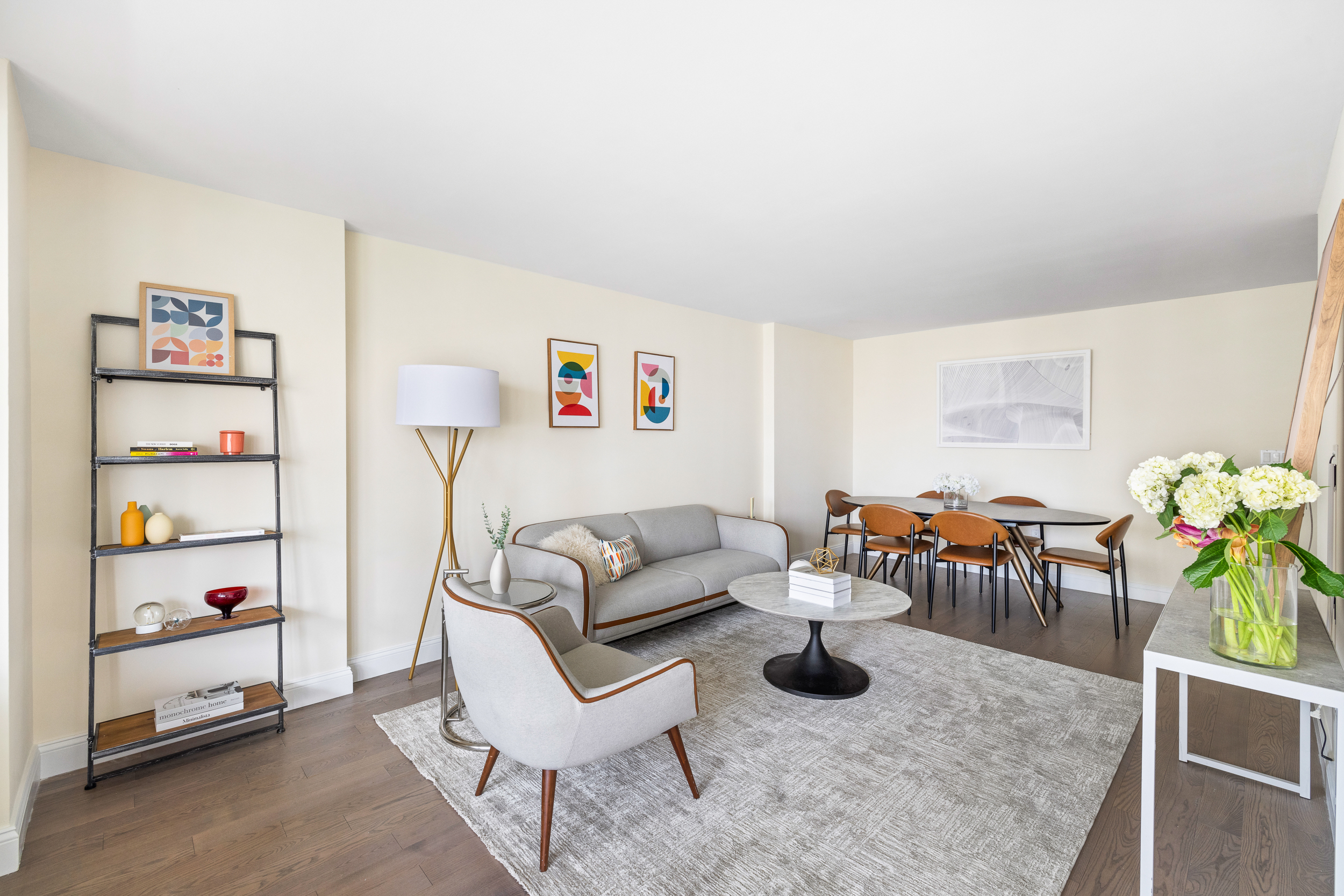100 West 93rd Street, Unit 11J Manhattan, NY 10025 - Photo 3 of 13 a living room with furniture and a potted plant