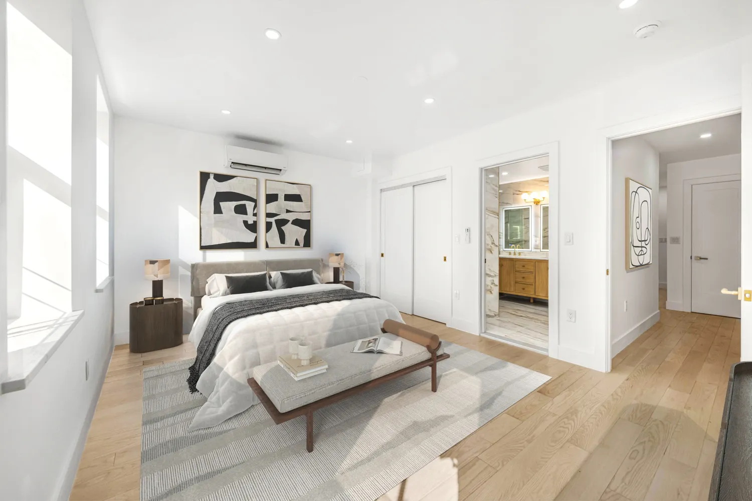 a bedroom with a large bed and furniture