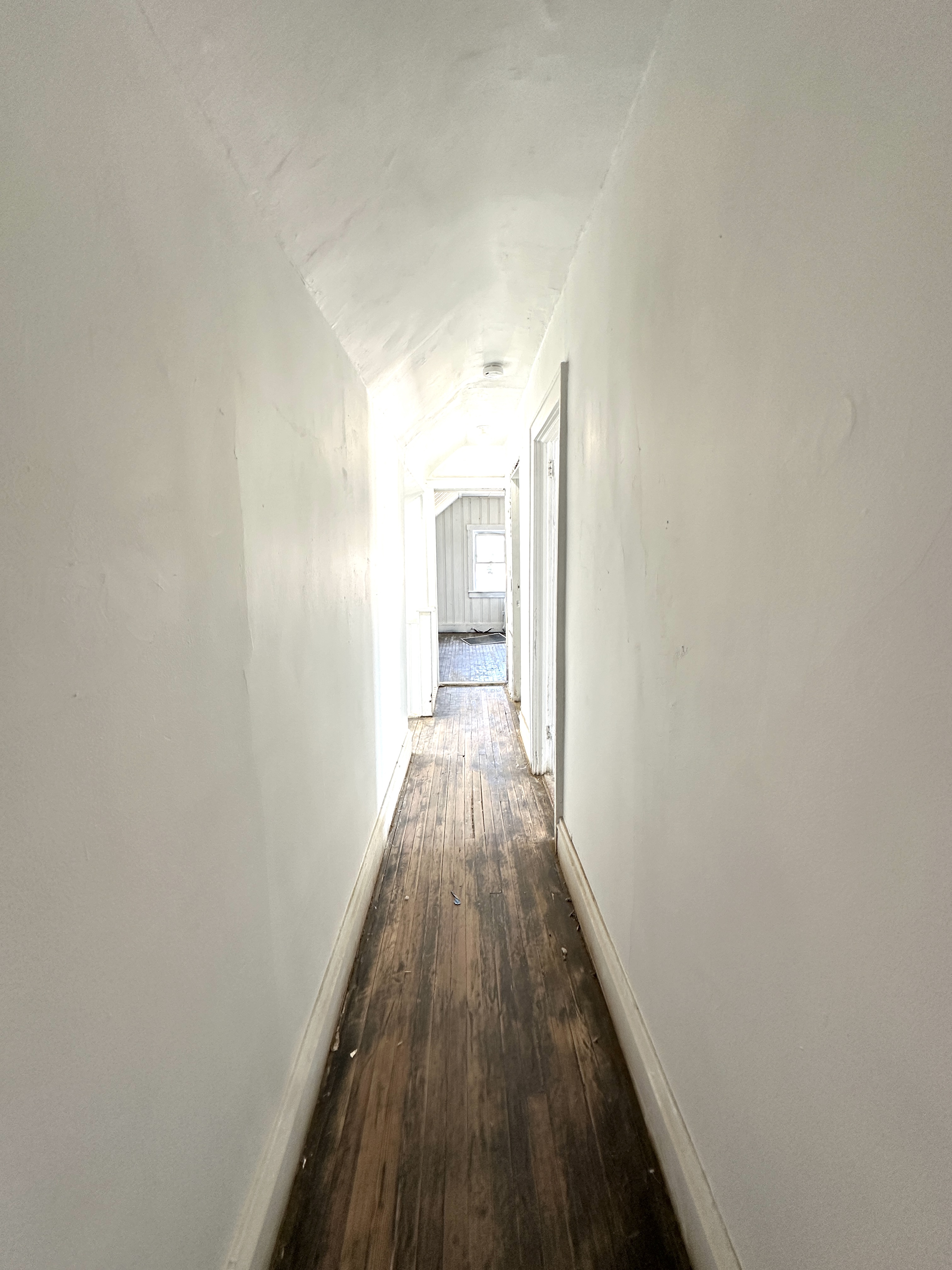 92-64 Springfield Boulevard Queens, NY 11428 - Photo 20 of 25 a view of a hallway with wooden floor