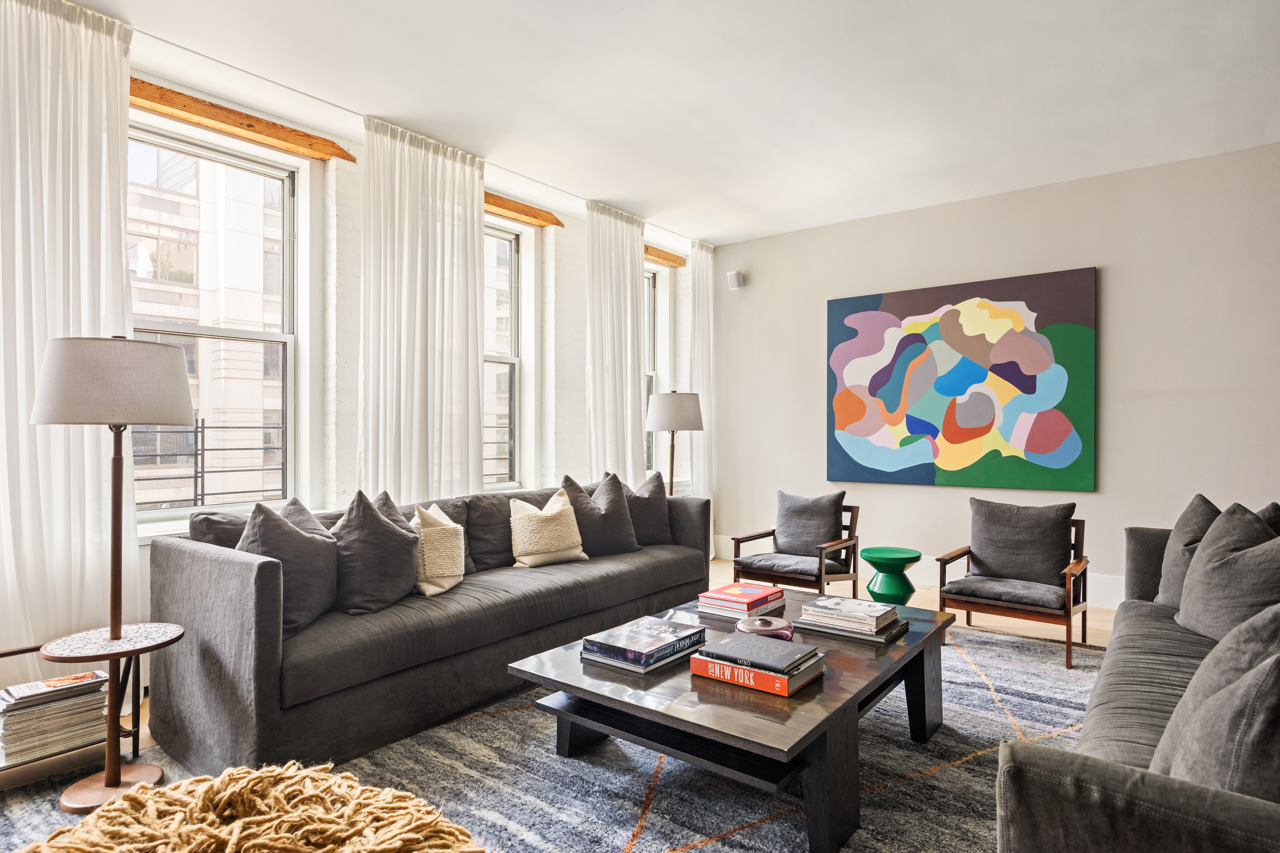 622 Greenwich Street, Unit 4B Manhattan, NY 10014 - Photo 5 of 27 a living room with furniture potted plant and a window