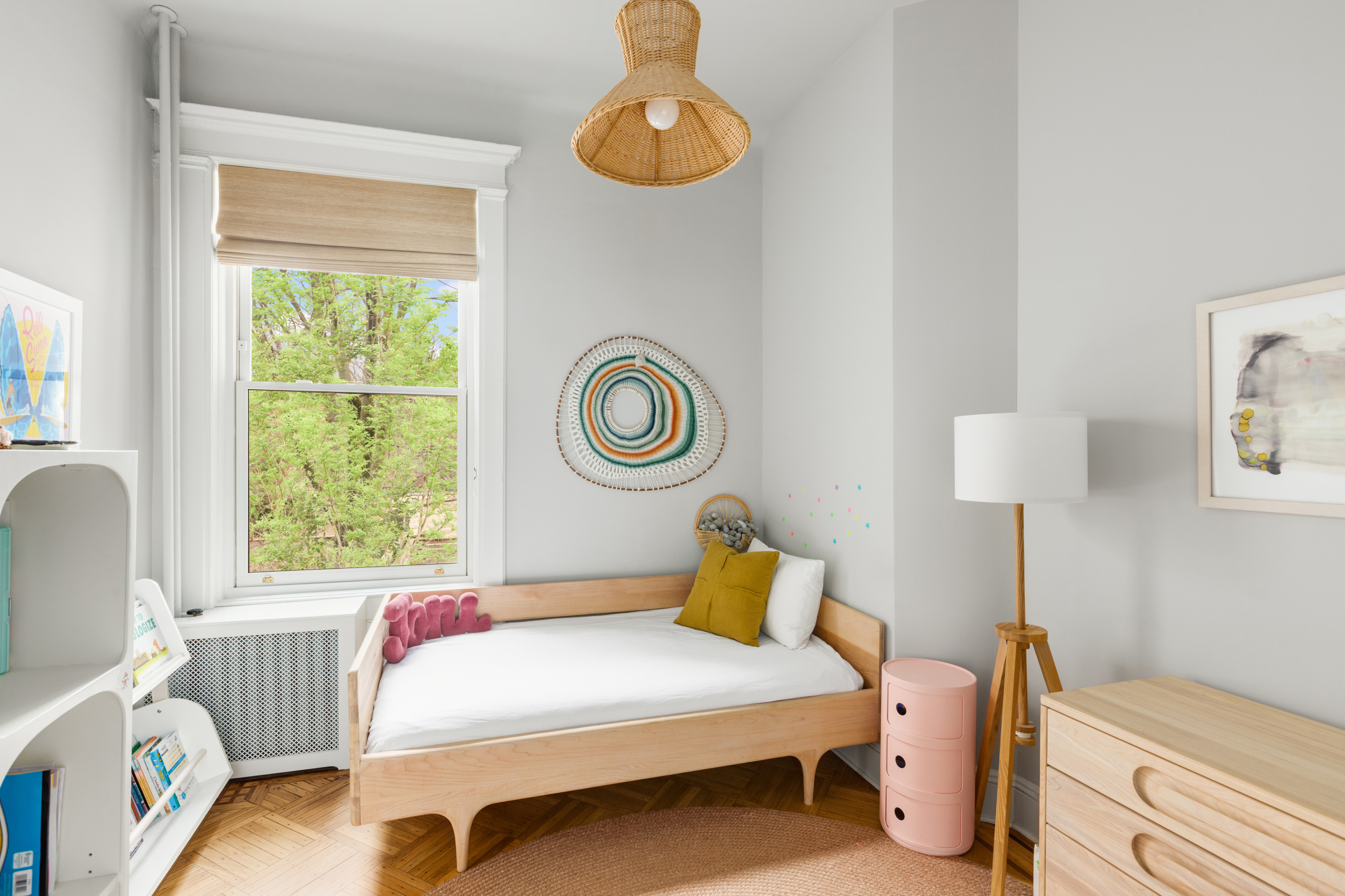 152 Underhill Avenue Brooklyn, NY 11238 - Photo 15 of 20 a bedroom with a bed and a window