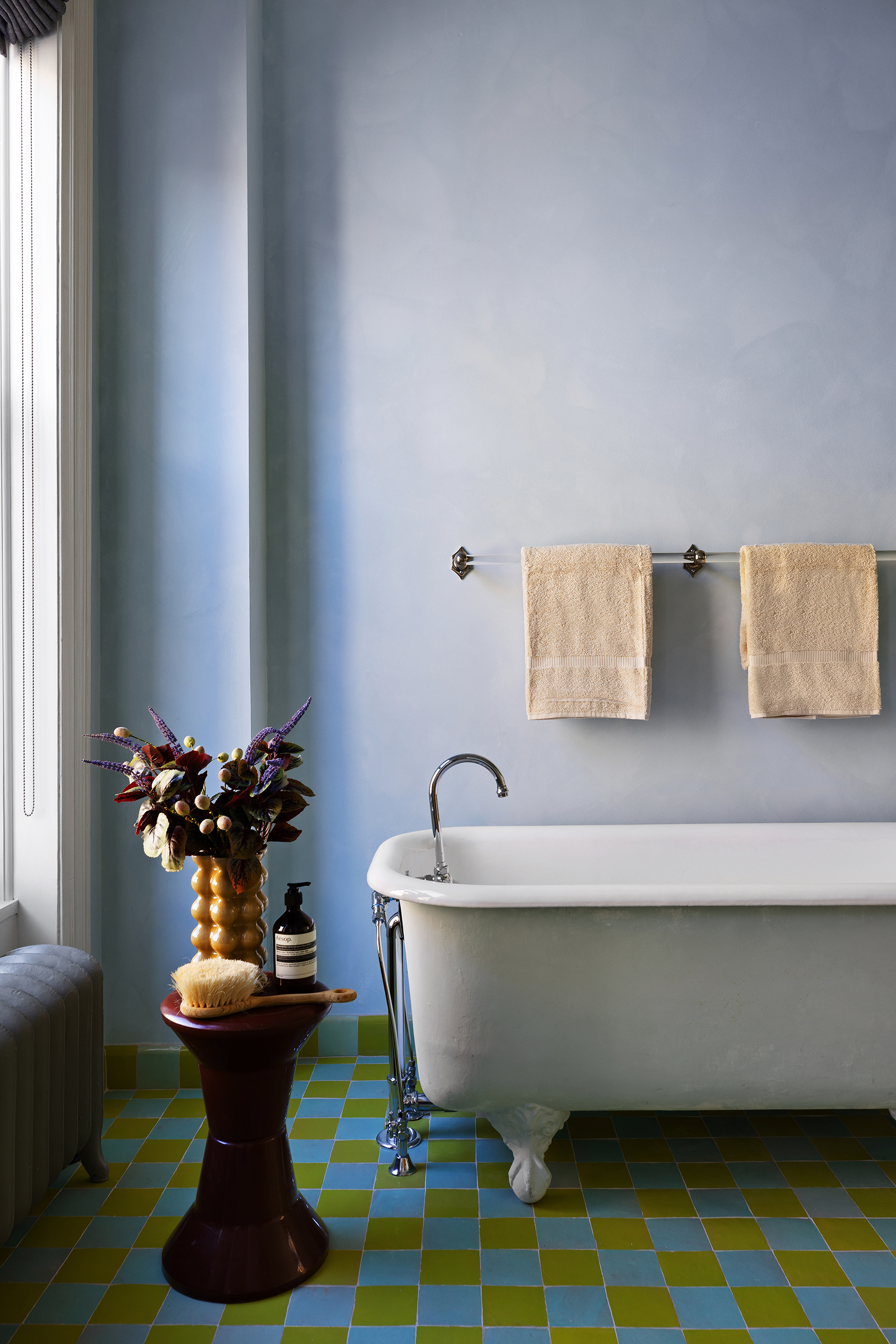234 Clinton Street Brooklyn, NY 11201 - Photo 10 of 19 a white vase with flowers sitting on a table
