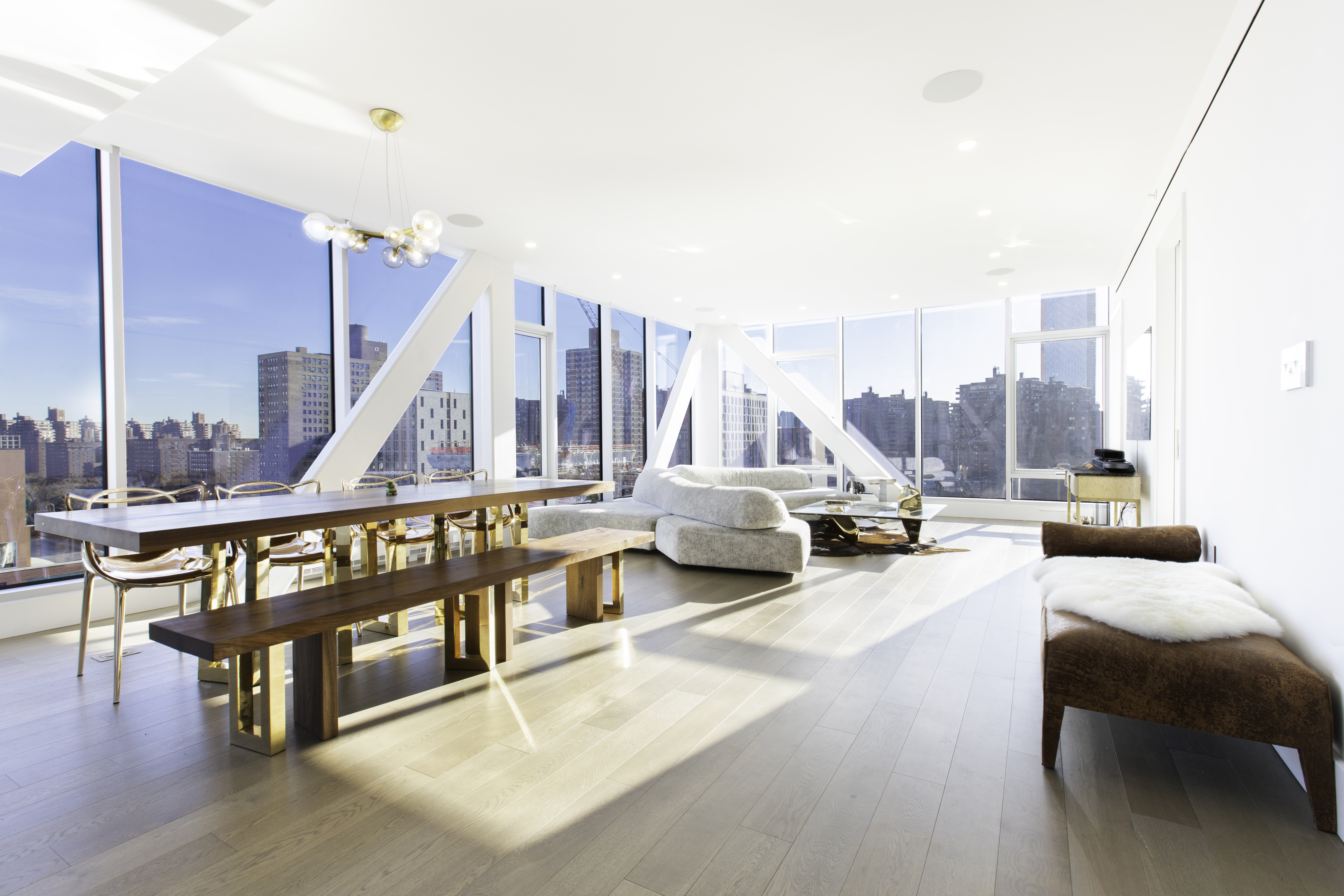 100 Norfolk Street, Unit PH Manhattan, NY 10002 - Photo 2 of 23 a view of living room with furniture and floor to ceiling window