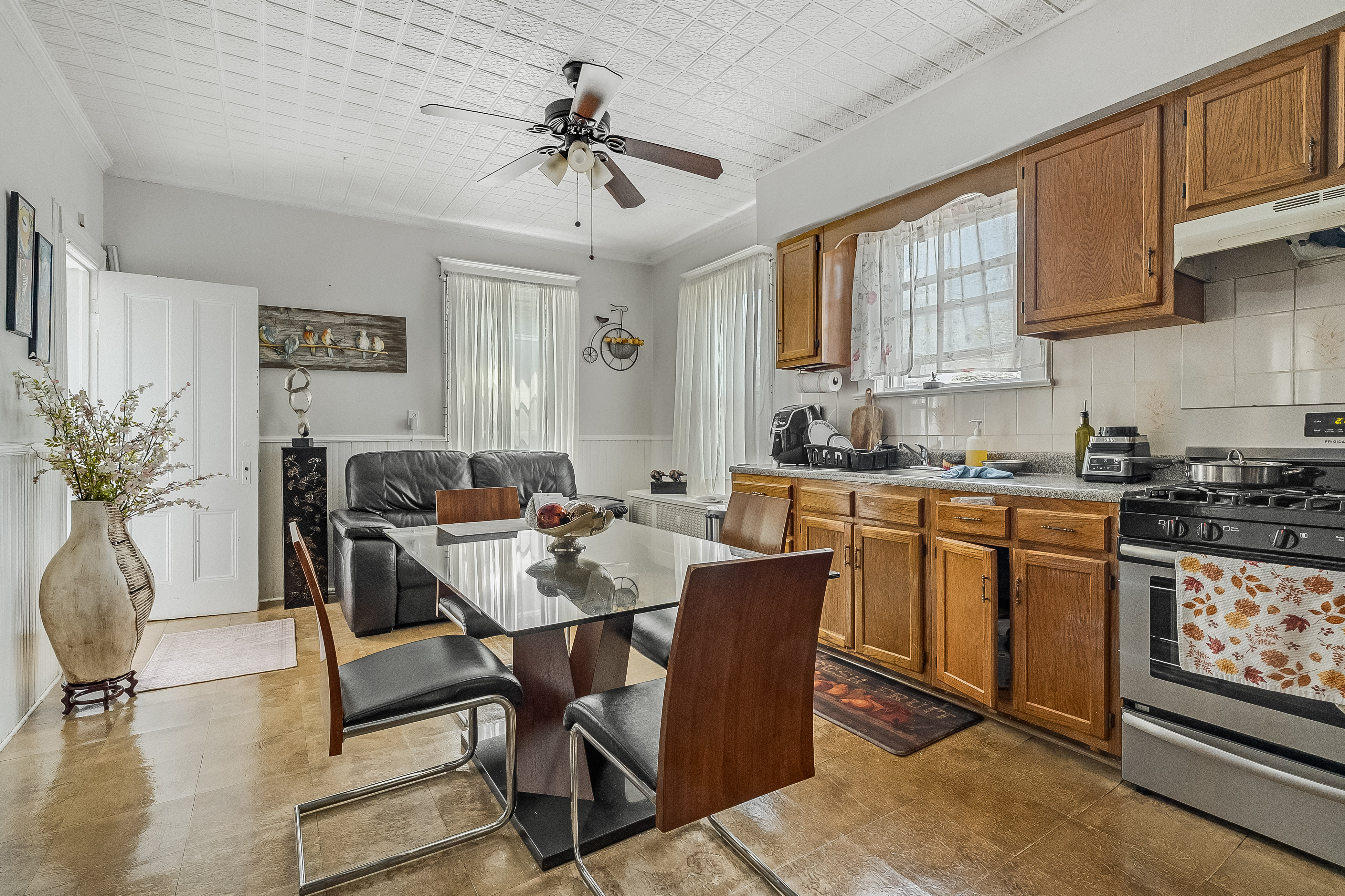 102-104 22nd Avenue Paterson, NJ 07513 - Photo 10 of 37 a view of a dining room with furniture