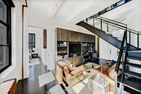 a view of living room and dining room