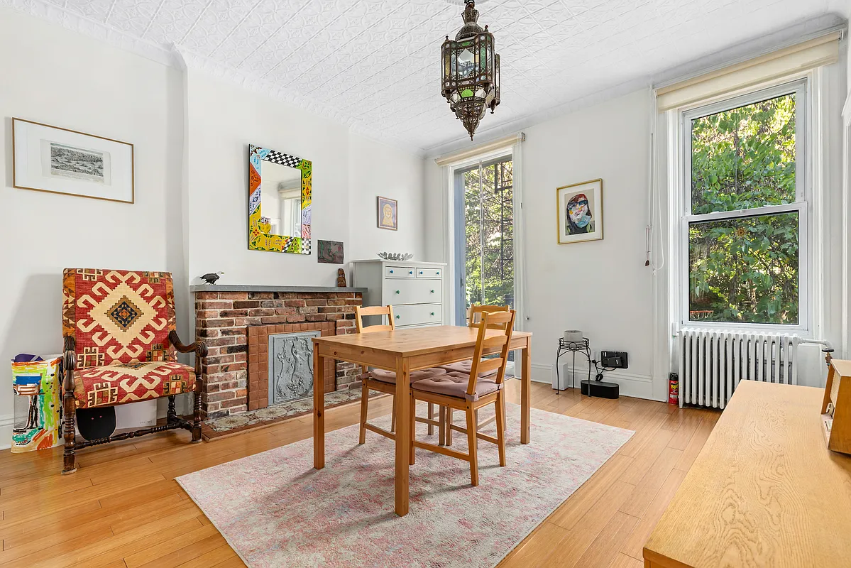 155 Luquer Street, Unit 1 Brooklyn, NY 11231 - Photo 3 of 13 a workspace with furniture and window