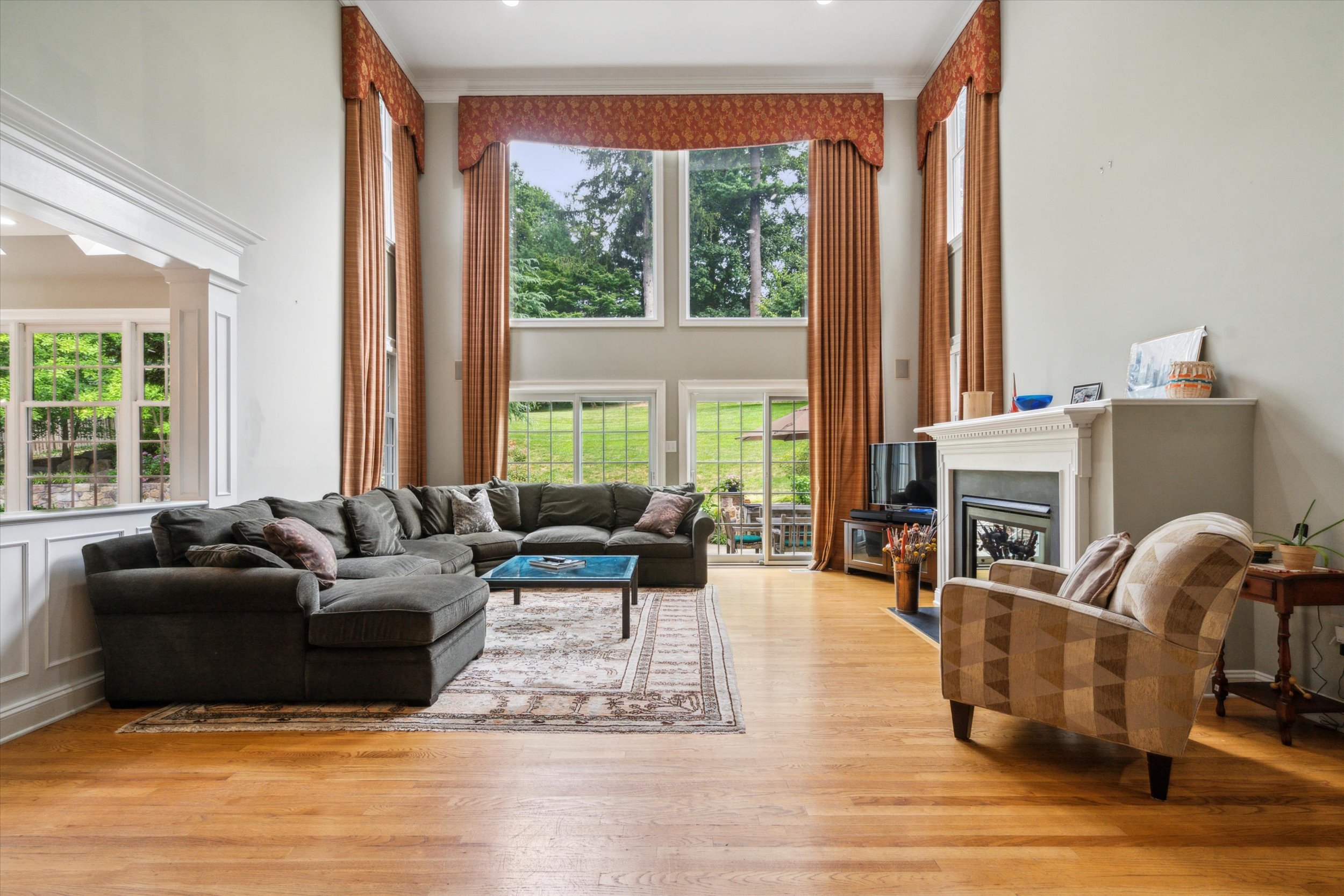 145 Biddulph Road Wayne, PA 19087 - Photo 10 of 39 a living room with furniture and a fireplace