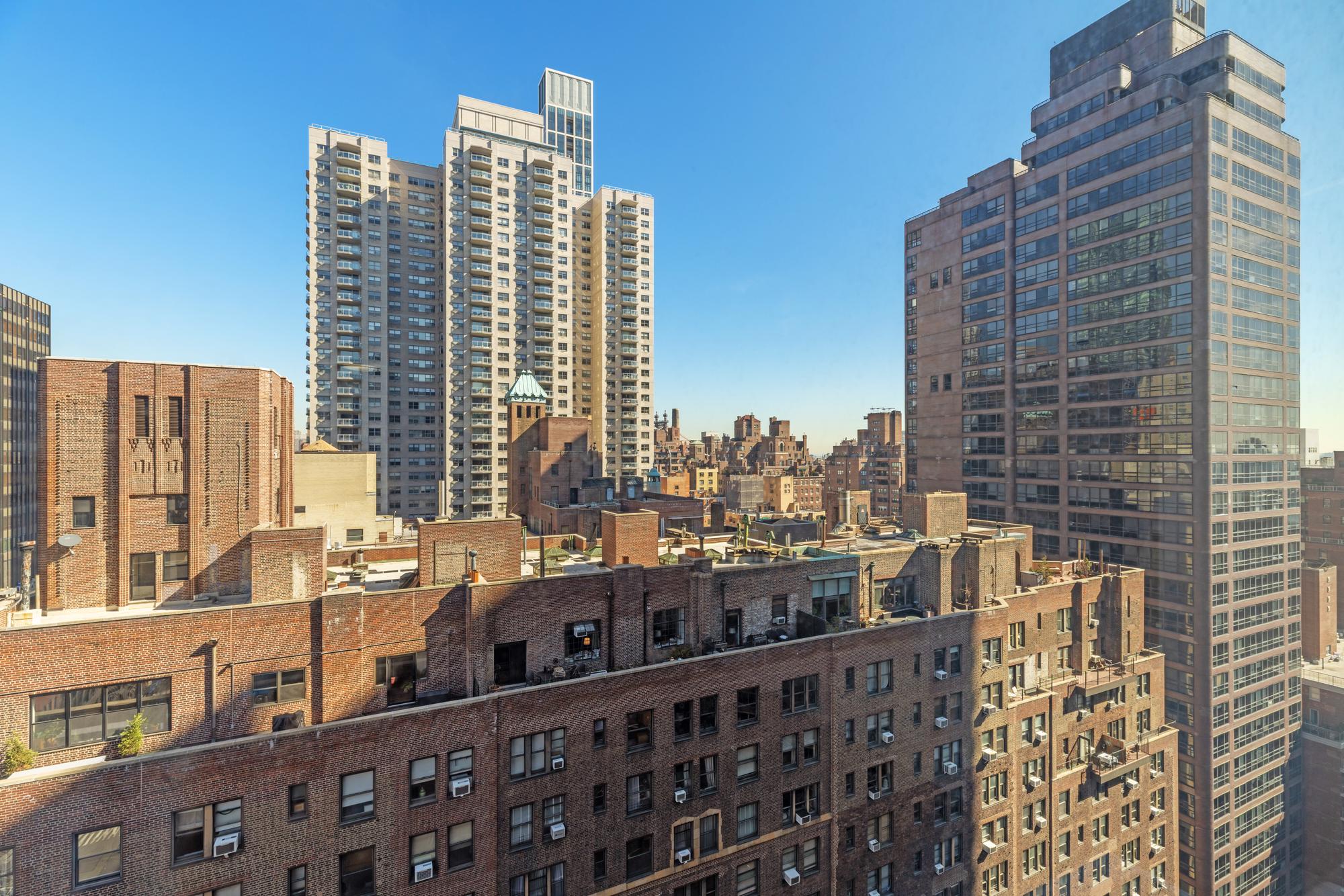 400 East 54th Street, Unit 22D Manhattan, NY 10022 - Photo 2 of 21 a view of city with tall buildings
