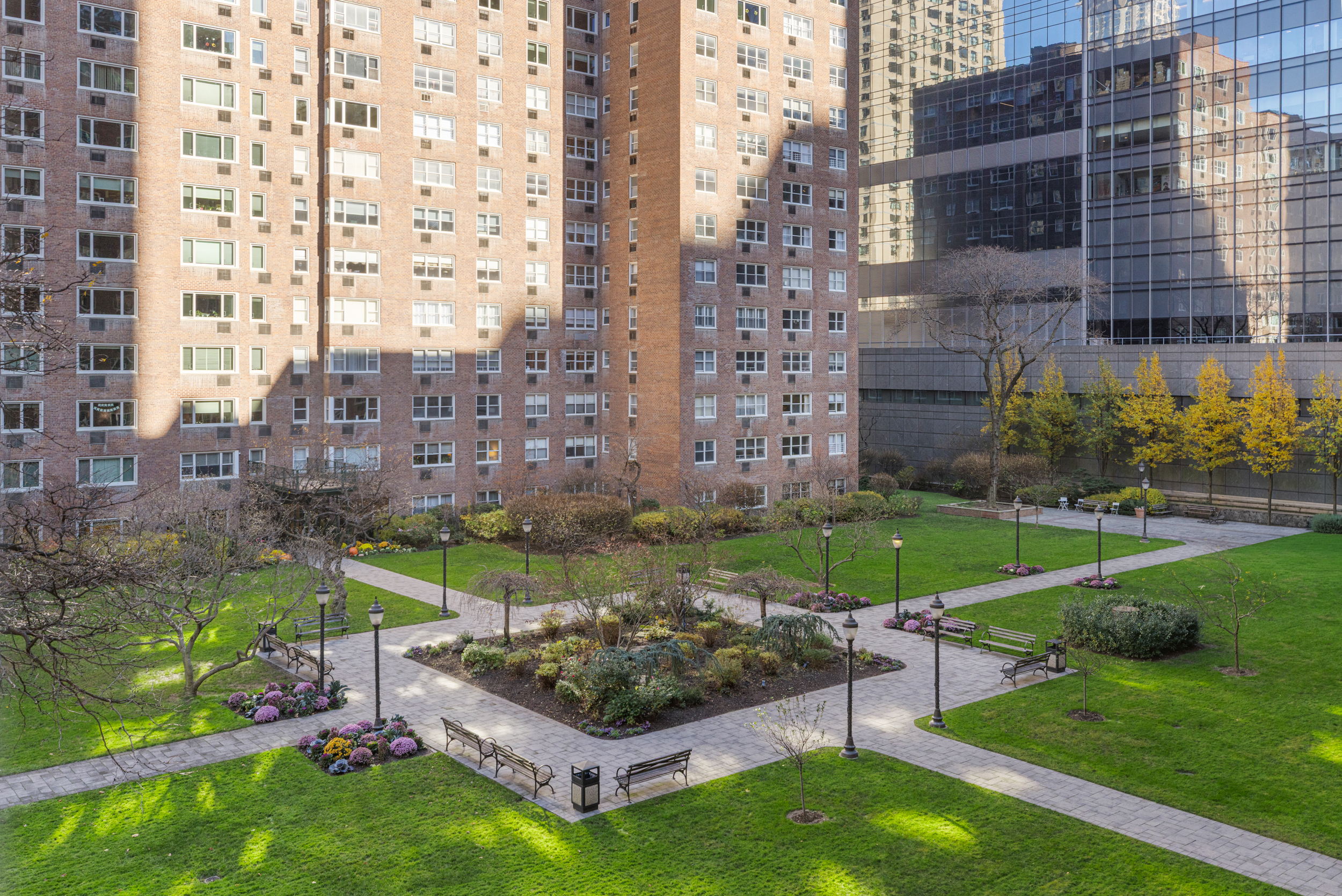 345 West 58th Street, Unit 4Y Manhattan, NY 10019 - Photo 5 of 12 a view of a chair and table in the garden