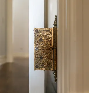 a view of gallery with wooden floor