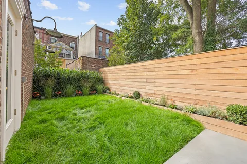 a view of balcony with small garden