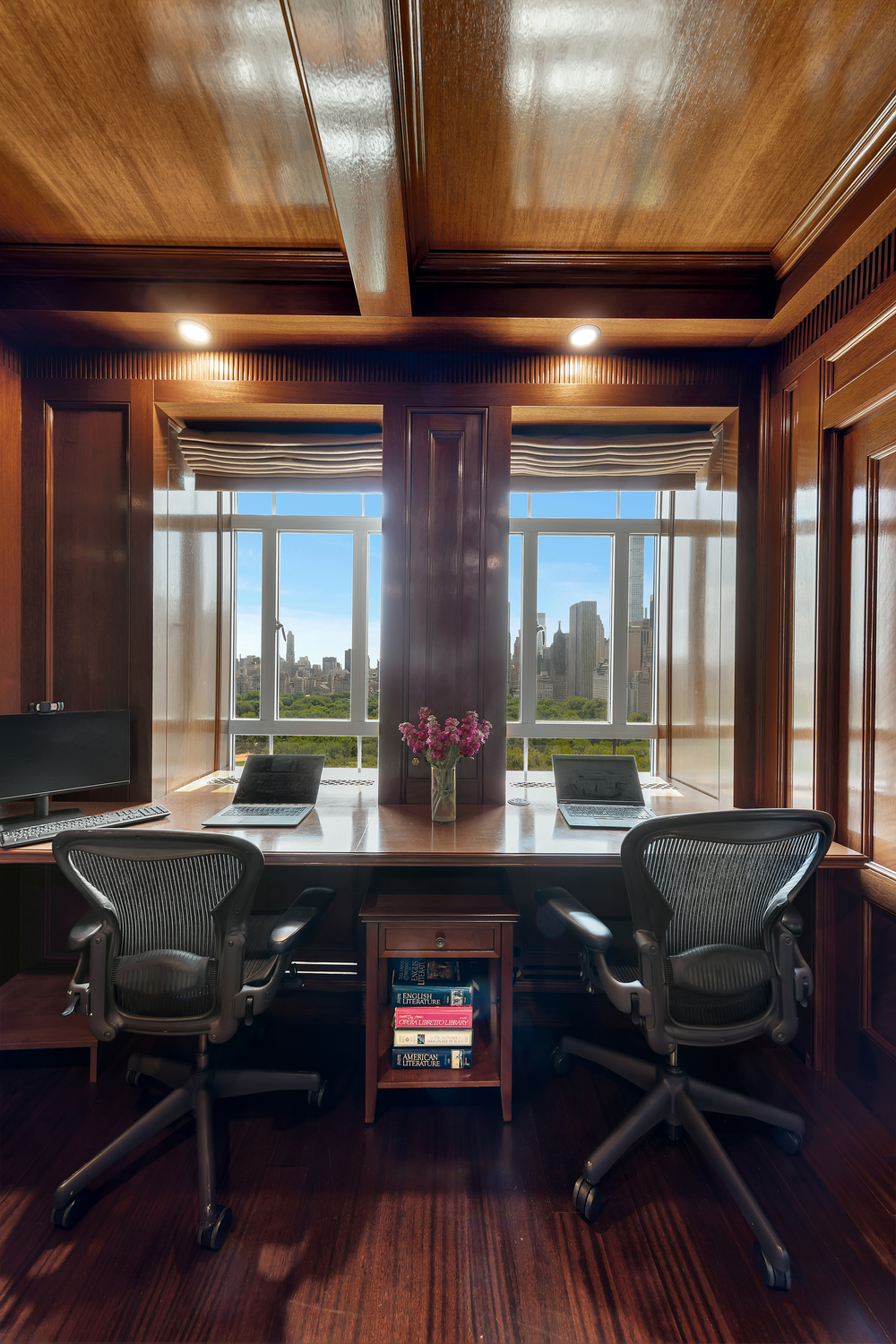 25 Central Park West, Unit 21J Manhattan, NY 10023 - Photo 27 of 37 a living room with furniture and a large window