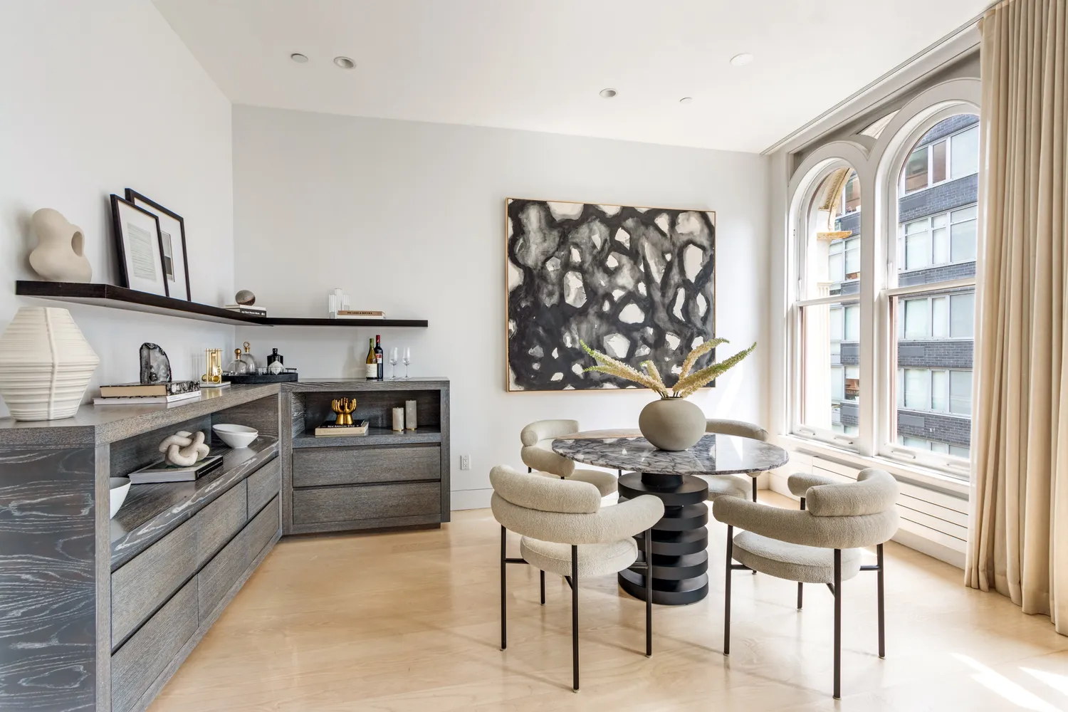 a kitchen with stainless steel appliances kitchen island granite countertop a stove a sink and a refrigerator