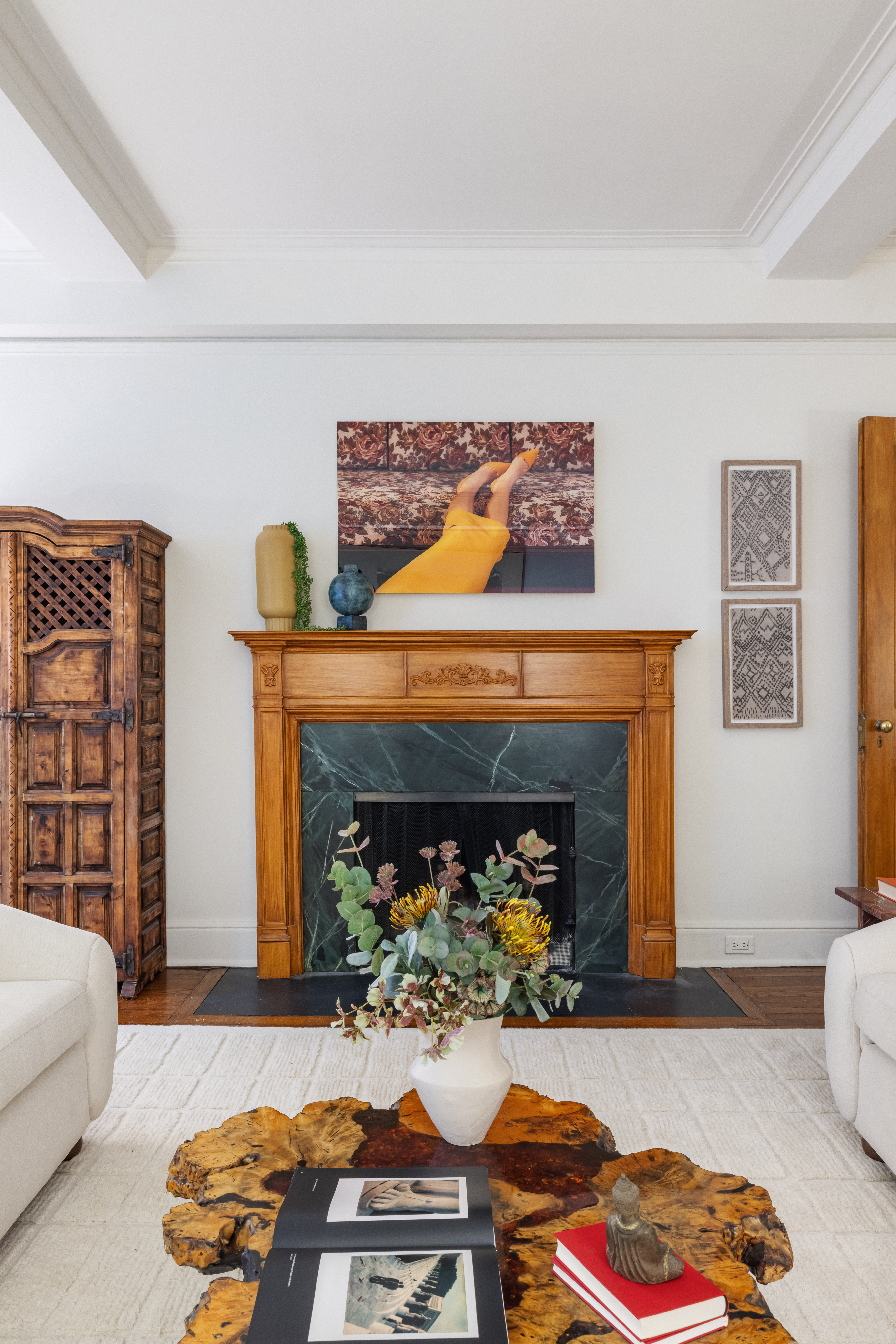 320 East 72nd Street, Unit 5B Manhattan, NY 10021 - Photo 2 of 18 a living room with furniture and a fireplace