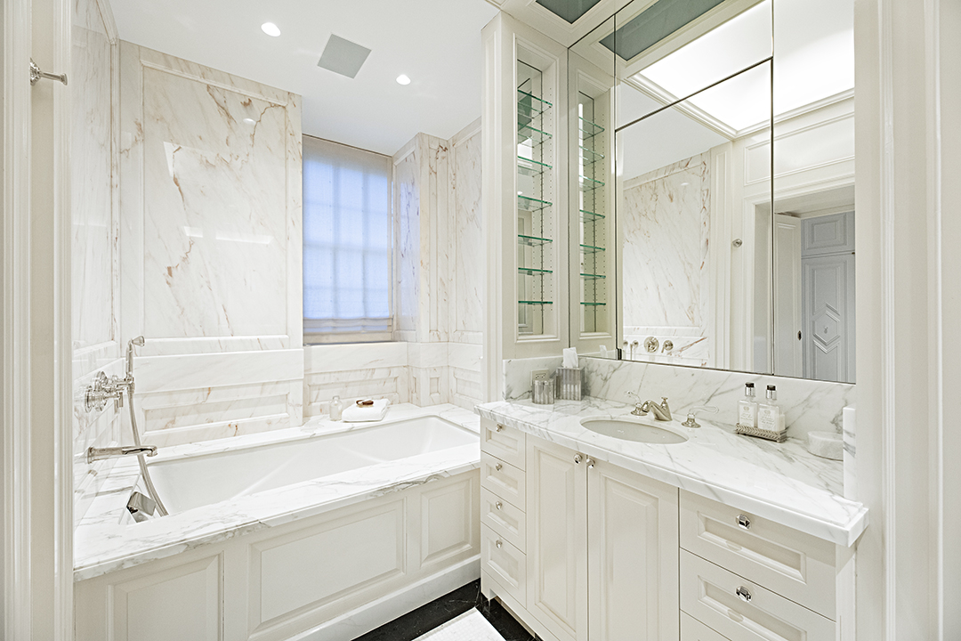 730 Park Avenue, Unit 7/8A Manhattan, NY 10021 - Photo 16 of 26 a bathroom with a double vanity sink mirror and double