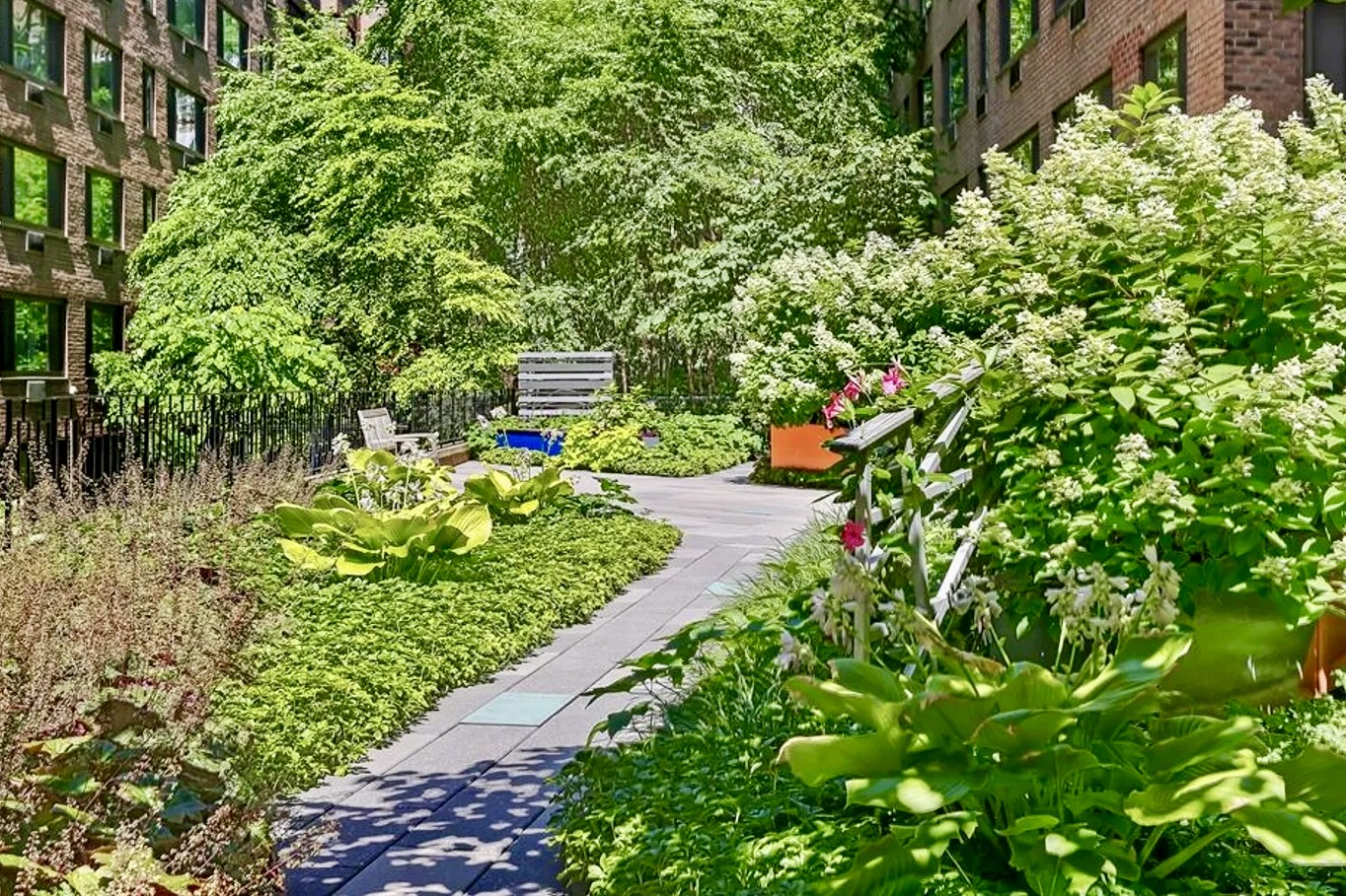 425 East 63rd Street, Unit E7A Manhattan, NY 10065 - Photo 11 of 13 a plant that is sitting in the garden