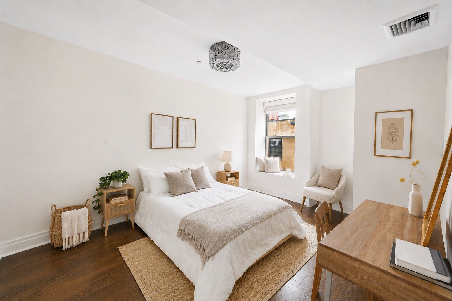 257 West 117th Street, Unit 2F Manhattan, NY 10026 - Photo 9 of 21 a bedroom with a bed and wooden floor