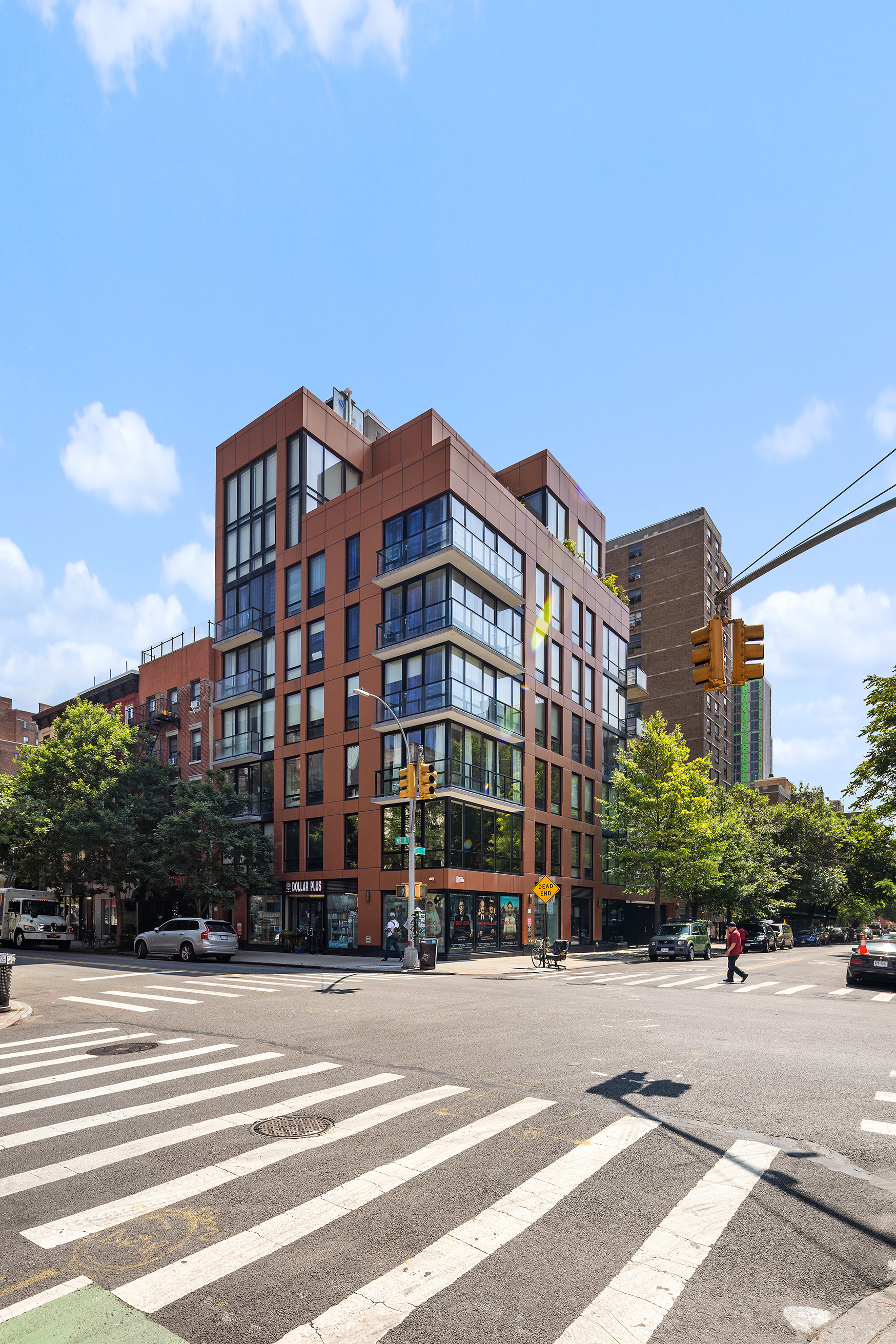 215 Avenue B, Unit 4A Manhattan, NY 10009 - Photo 10 of 13 a view of a tall building next to a road