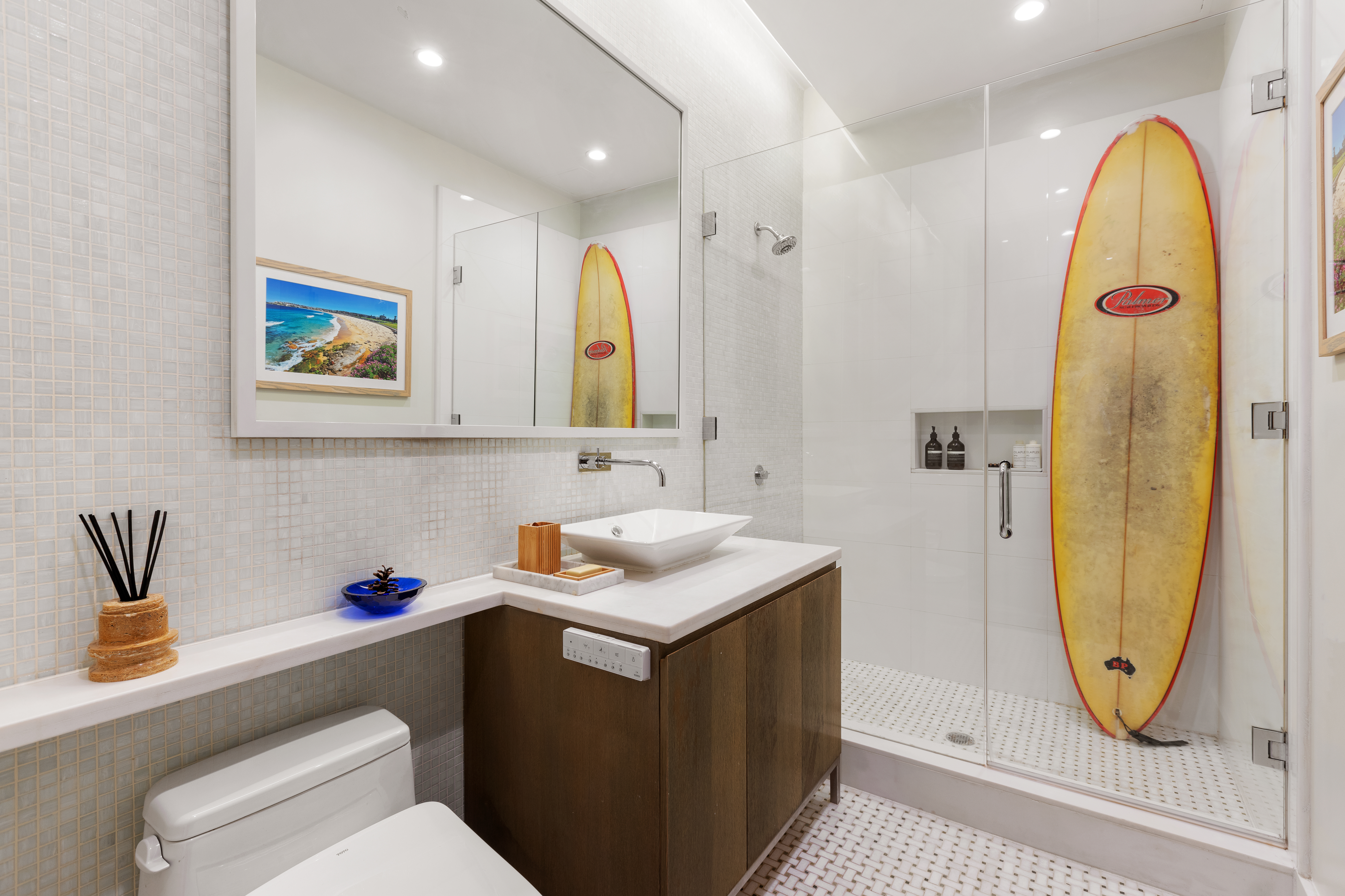 263 9th Avenue, Unit 2E Manhattan, NY 10001 - Photo 7 of 12 a bathroom with a sink mirror vanity and toilet