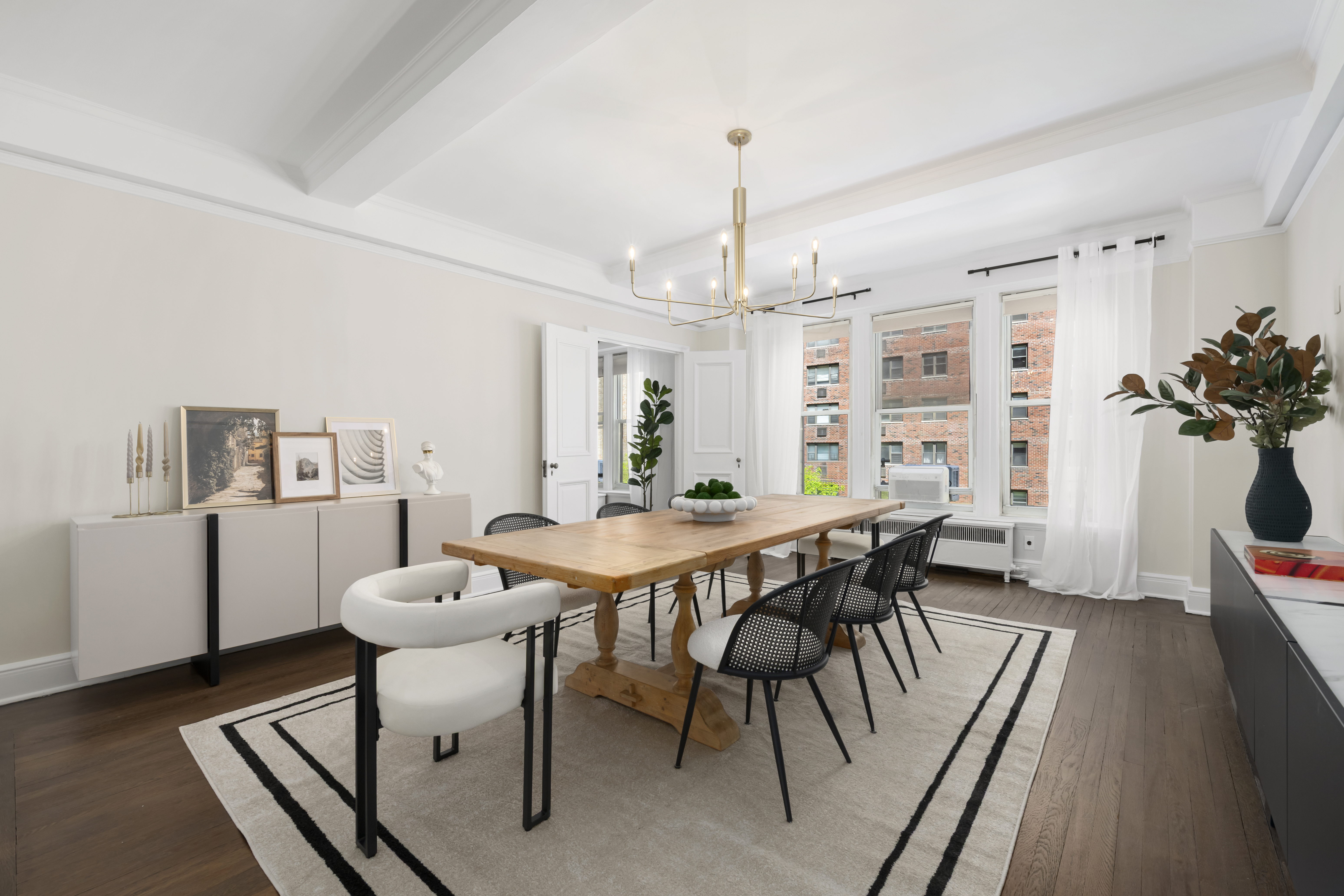 320 East 72nd Street, Unit 6A Manhattan, NY 10021 - Photo 4 of 13 a view of a dining room with furniture and wooden floor