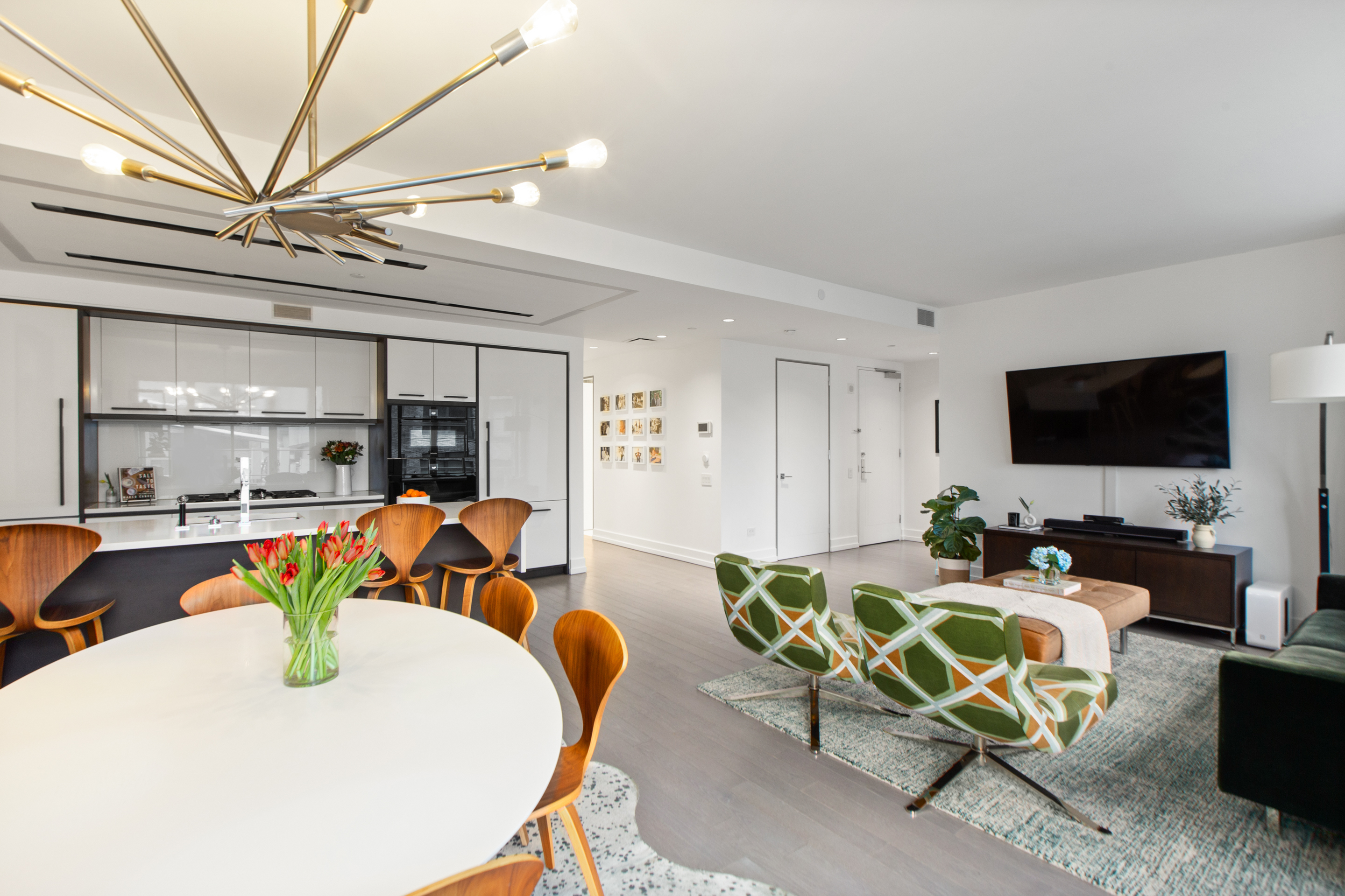 70 Charlton Street, Unit 16C Manhattan, NY 10014 - Photo 3 of 31 a view of a dining room with furniture