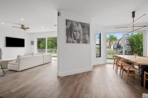 an aerial view of a house with a lake view