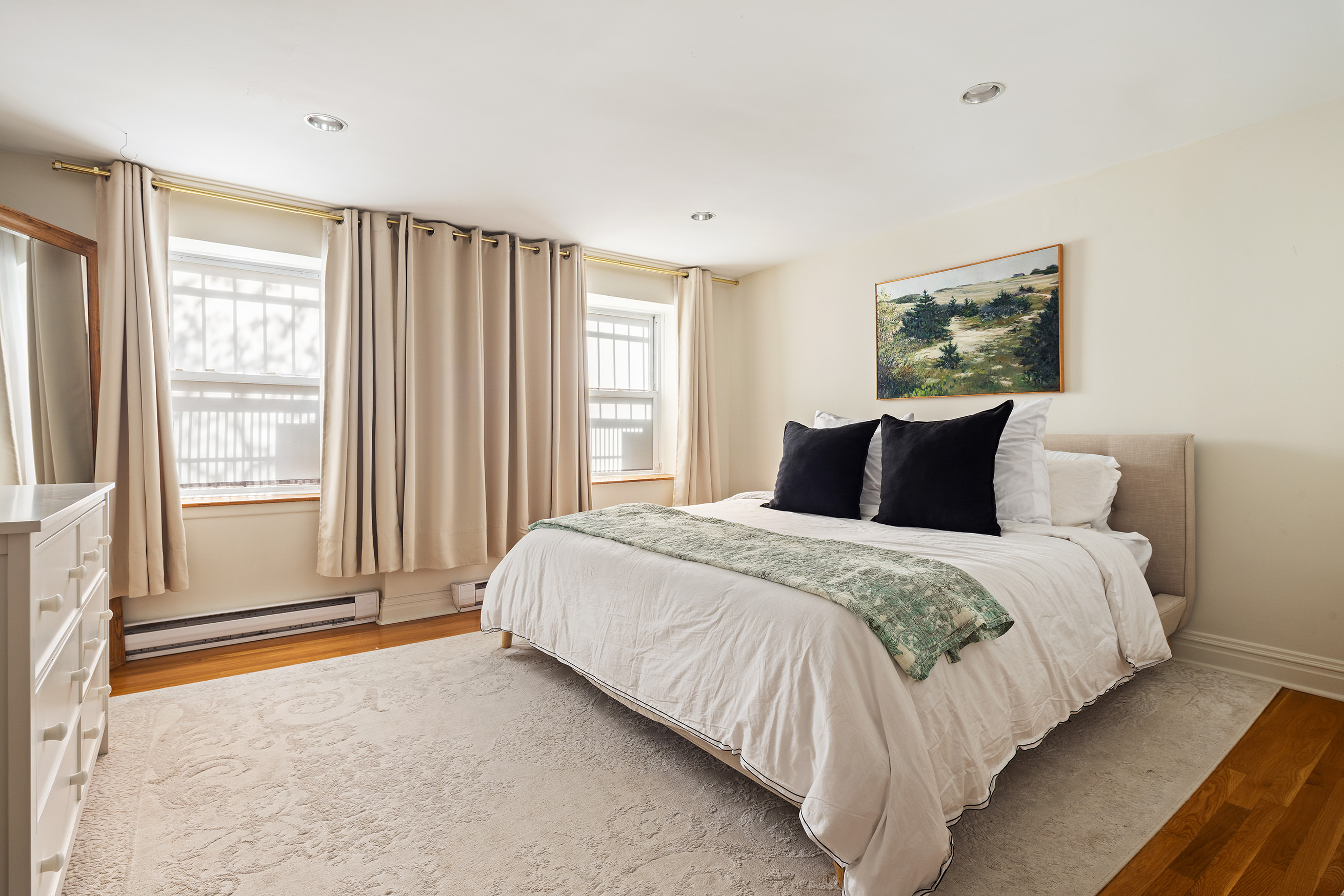 341 West 29th Street, Unit 1 Manhattan, NY 10001 - Photo 6 of 11 a bedroom with a bed and a window