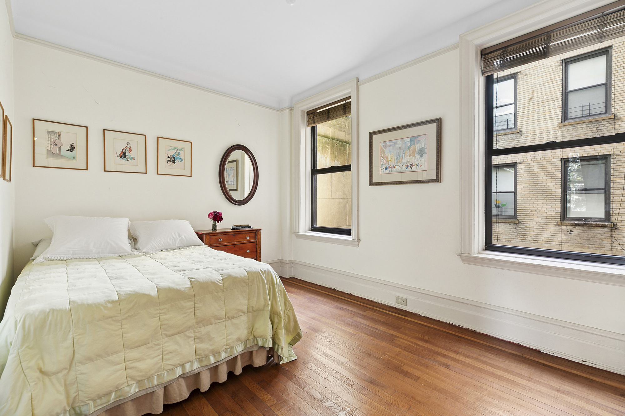 160 West 95th Street, Unit 4A Manhattan, NY 10025 - Photo 7 of 10 a bedroom with bed and two windows
