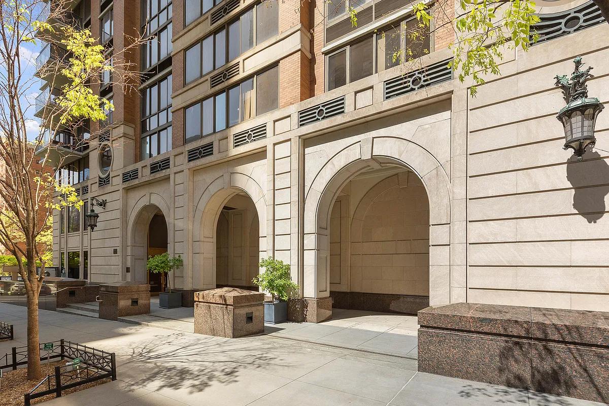 161 West 61st Street, Unit 19D Manhattan, NY 10023 - Photo 9 of 12 a front view of a house with outdoor